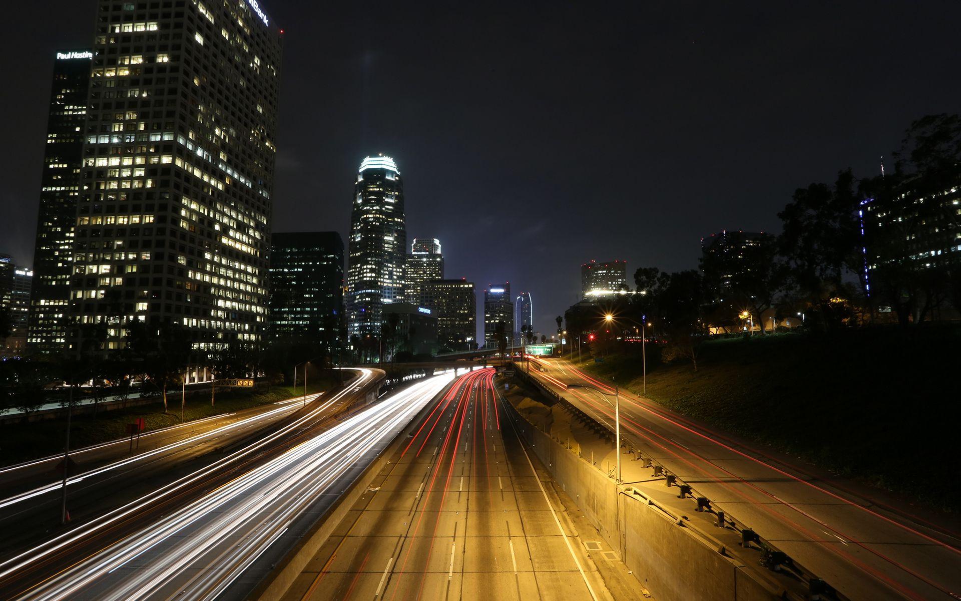 1920x1200 Buildings Skyscrapers Night Freeway Highway Lights roads cities timelapse wallpaperx1200