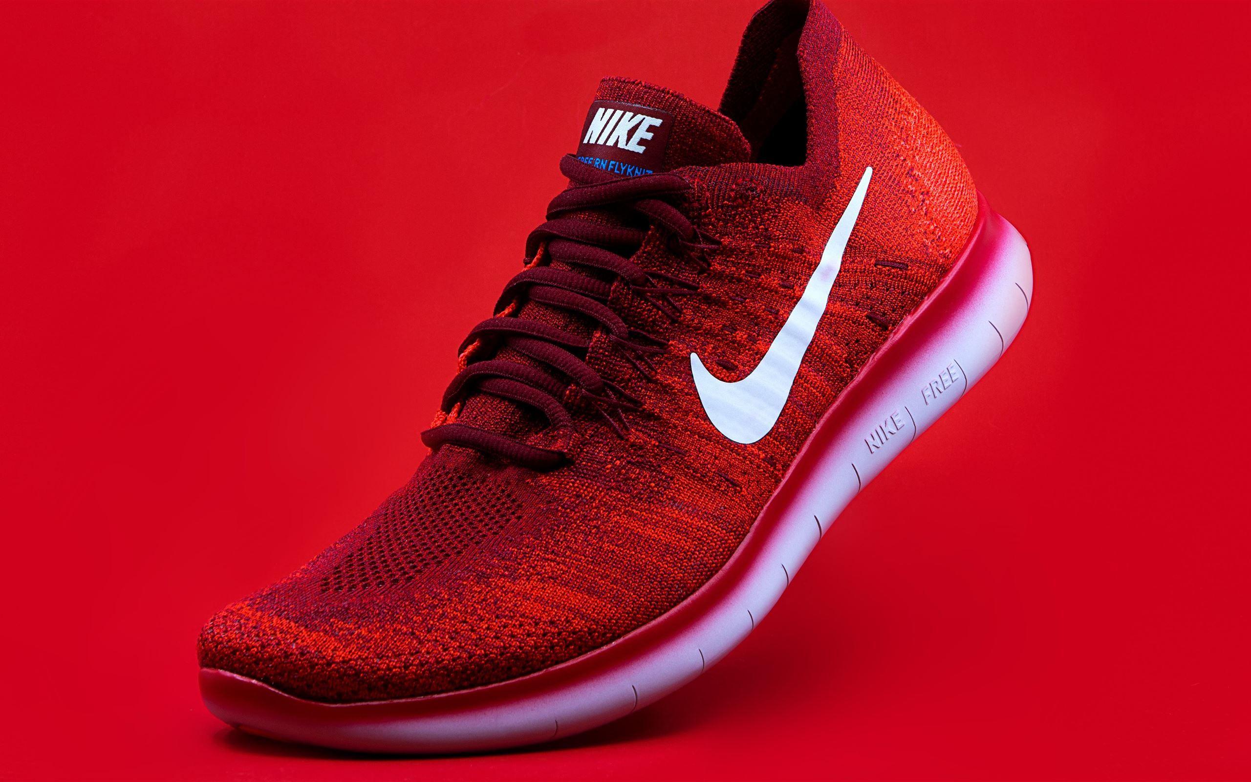 2560x1600 unpaired red Nike sneaker MacBook Air Wallpaper Download