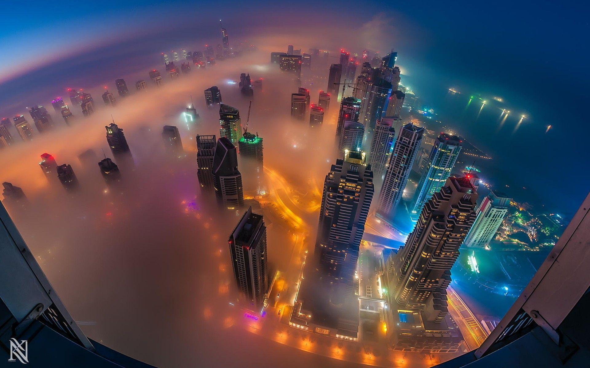 1920x1200 #cranes (machine), #night, #cityscape, #United Arab Emirates, #aerial view, #city, #Dubai, #clouds, #skyscraper, #mist, wallpaper. Mocah.org HD Wallpaper