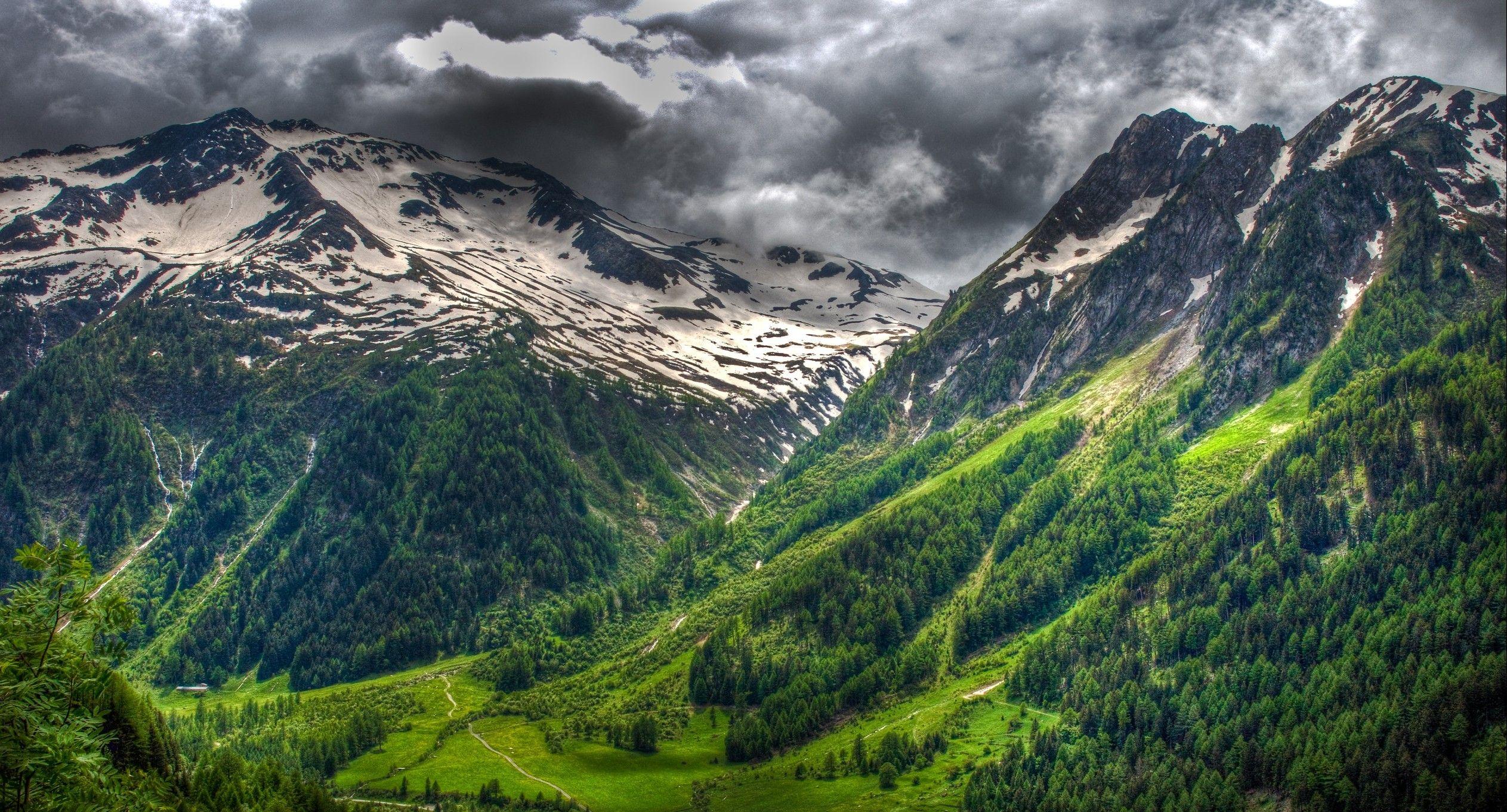 2526x1362 #mountains, #clouds, #Switzerland, #green, #forest, #landscape, #snowy peak, #grass, #nature, #spring, #Alps, wallpaper. Mocah.org HD Wallpaper
