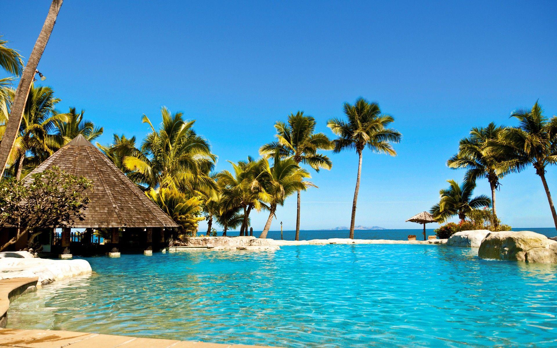 1920x1200 Water ocean Sun summer tropical Fiji palm trees huts swimming pools hotels Fiji islands resort relaxation sea beaches wallpaperx1200