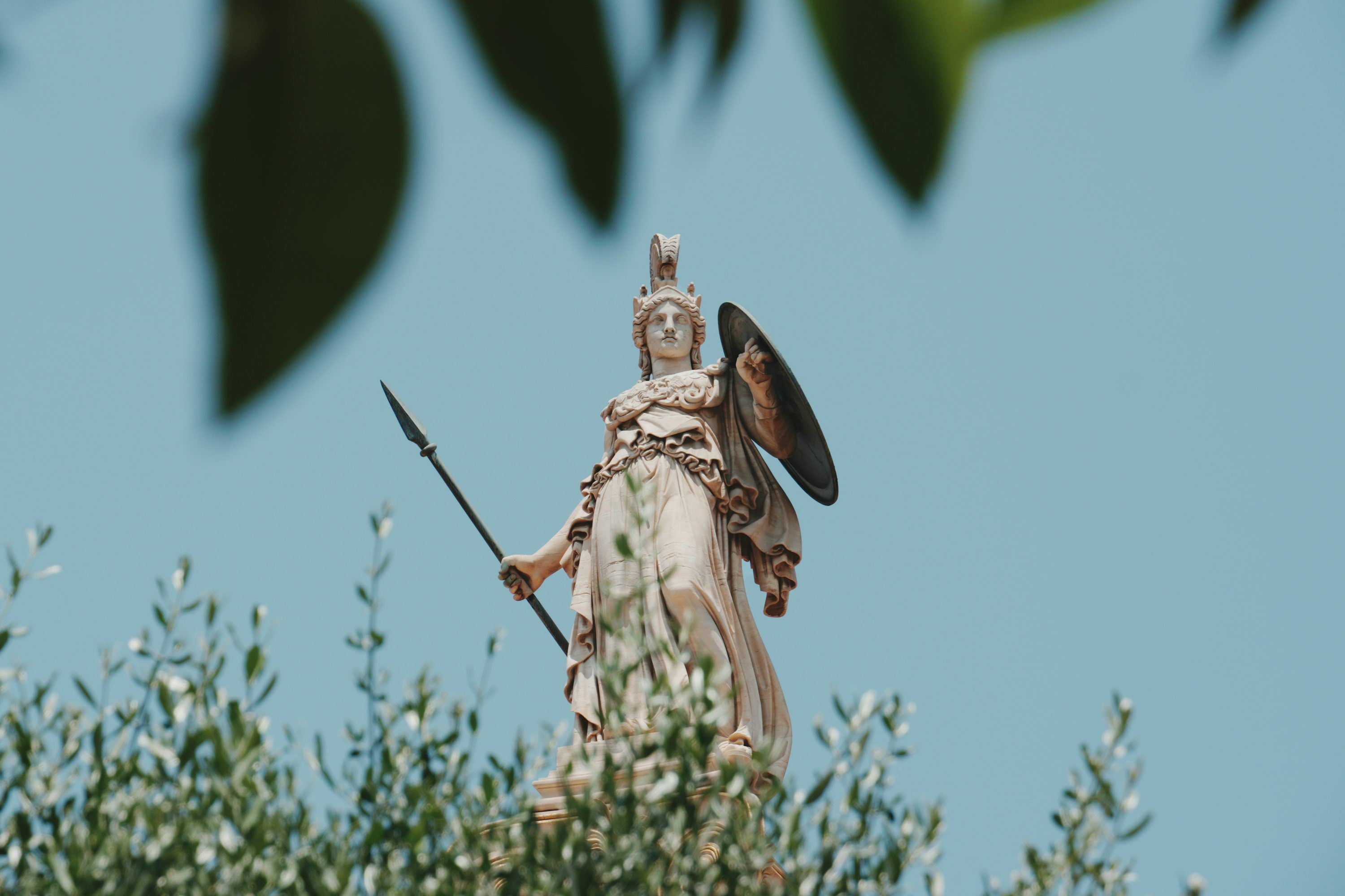 3000x2000 Statue of athena towers above the foliage. photo