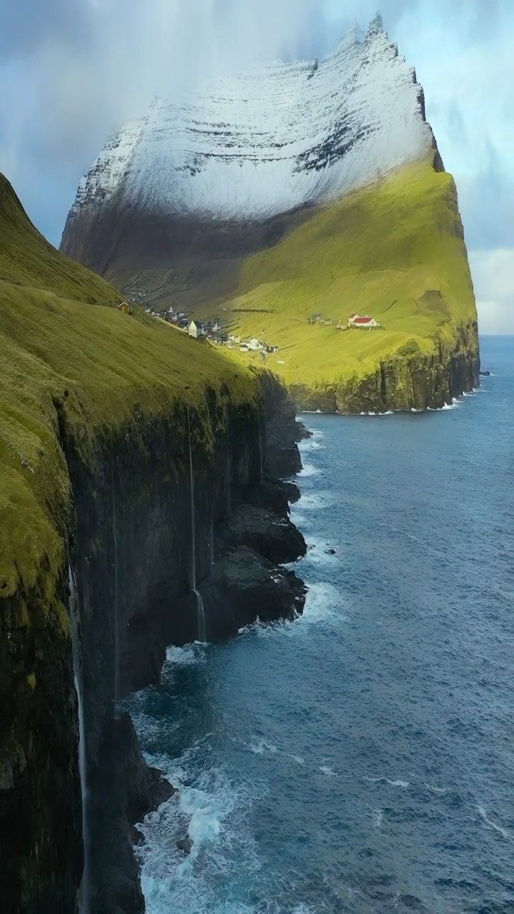 720x1280 Waterfalls into the Sea in Northern Faroe Islands. Iceland landscape with cliffs, Faroe islands 8k wallpaper, Beautiful places