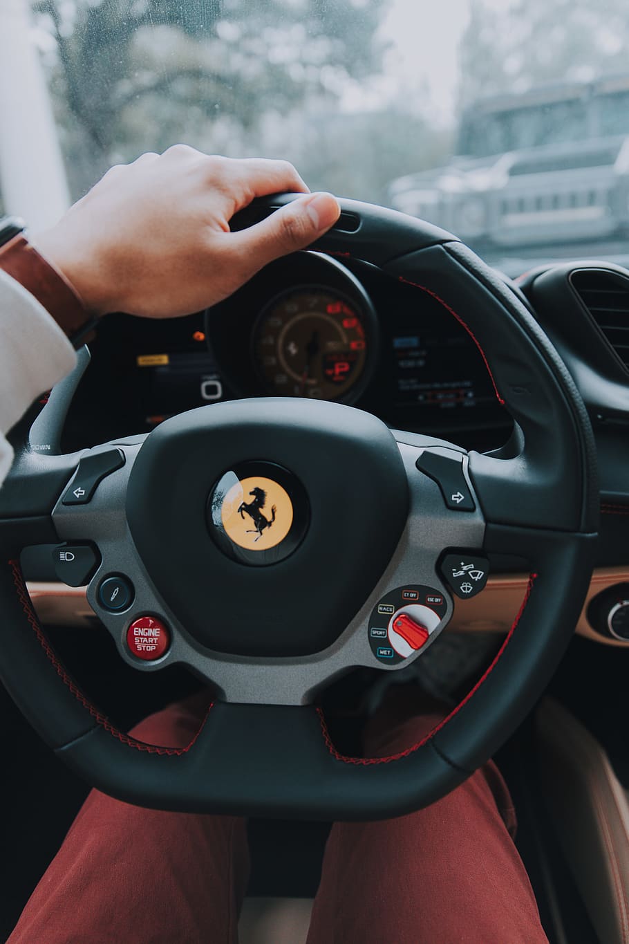 910x1365 person, ferrari multifunction steering wheel, clothing, apparel, helmet, steering wheel, wheel, human