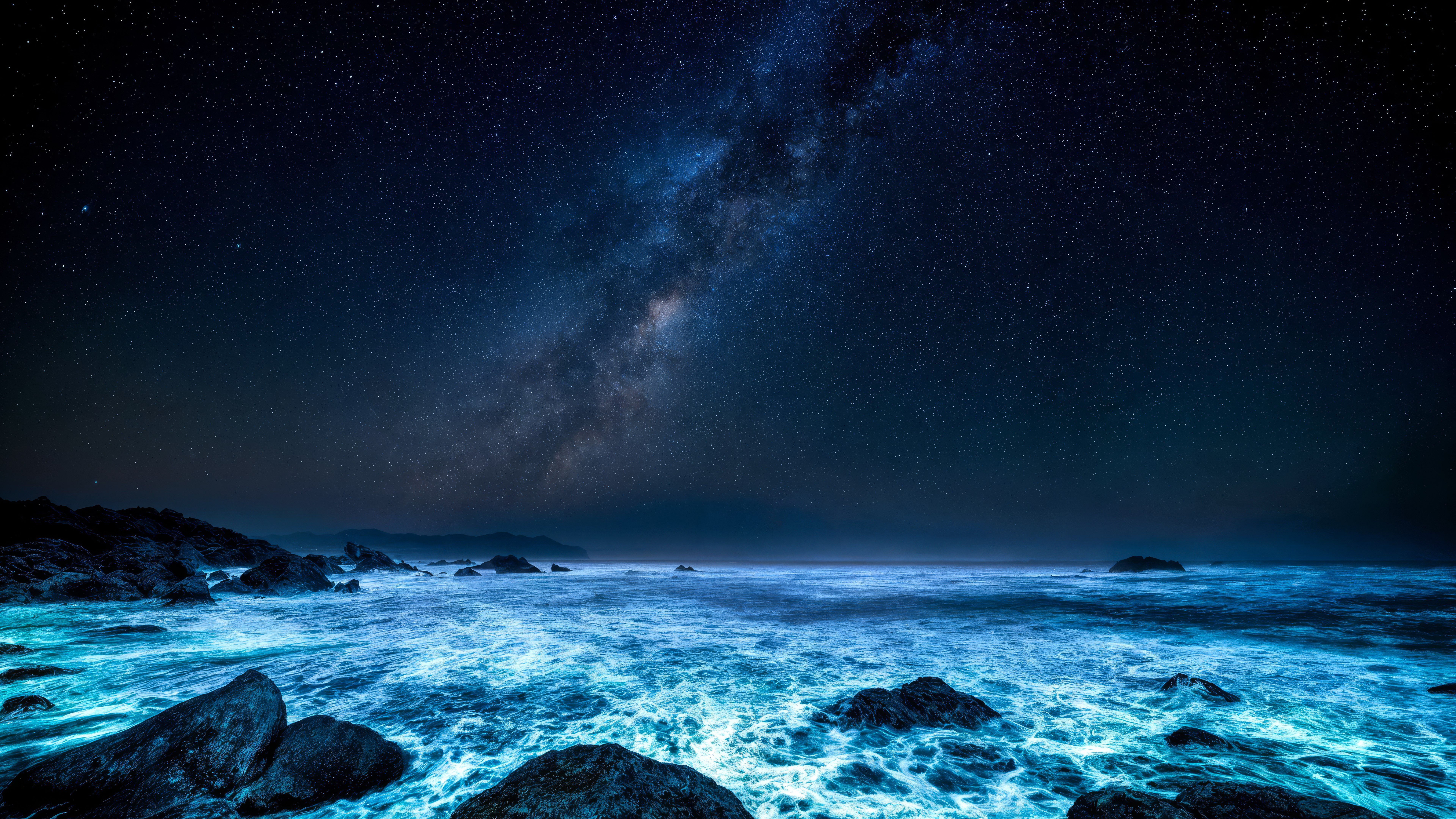 7680x4320 Bioluminescent Ocean Waves at Night under the Milky Way Wallpaper 4K for Desktop