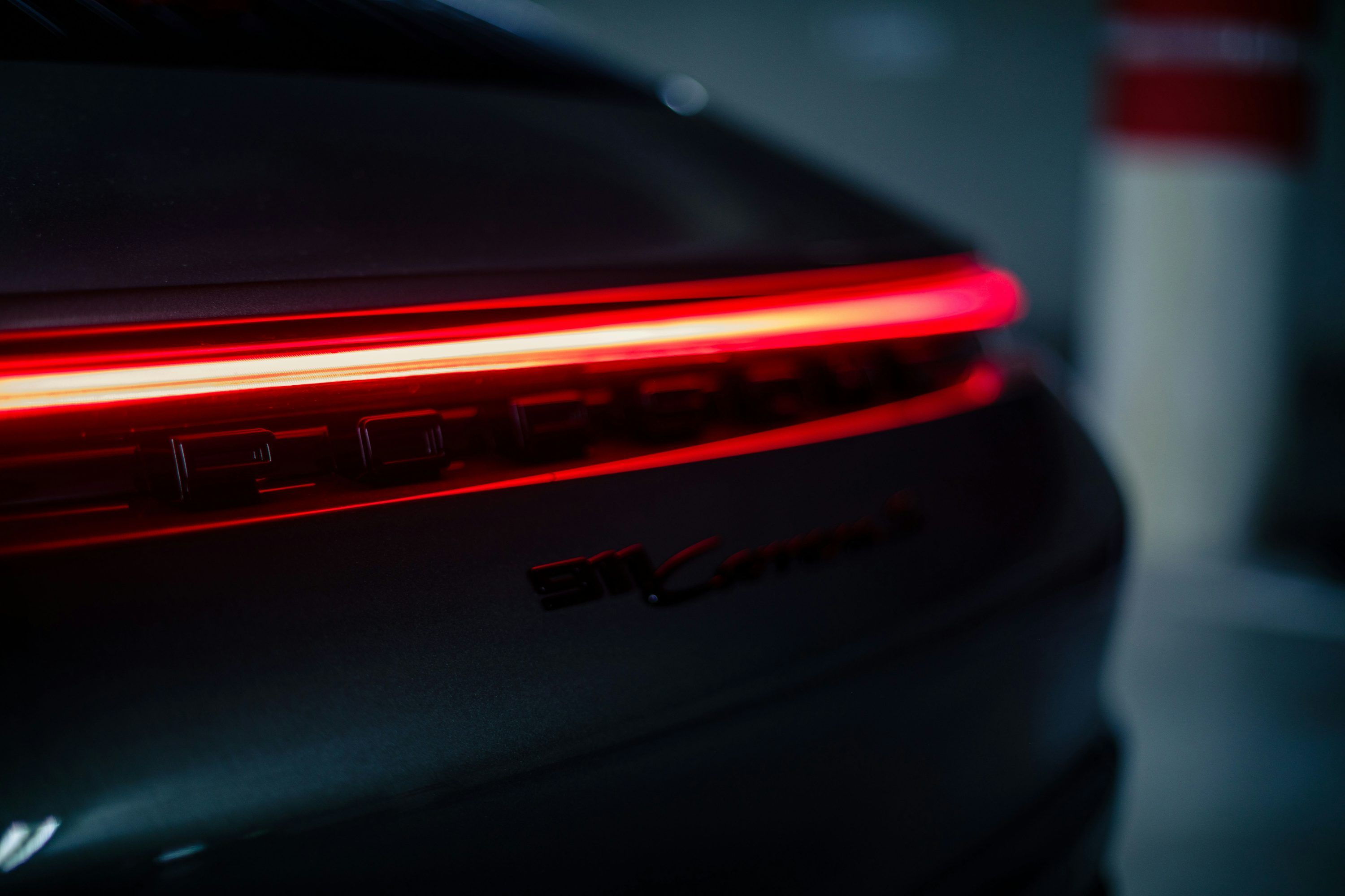 3000x2000 A close up of the tail light of a car photo