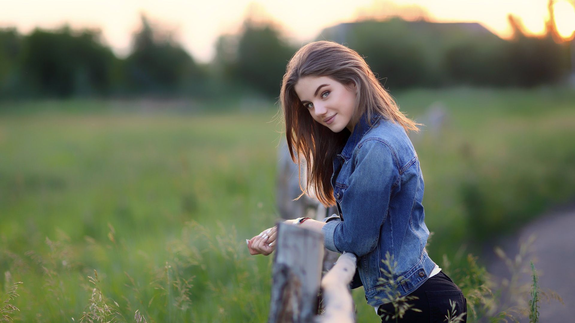 1920x1080 Beautiful Girl Model Is Standing In Blur Nature Background Wearing Blue Jeans Shirt And Pant HD Girls Wallpaper