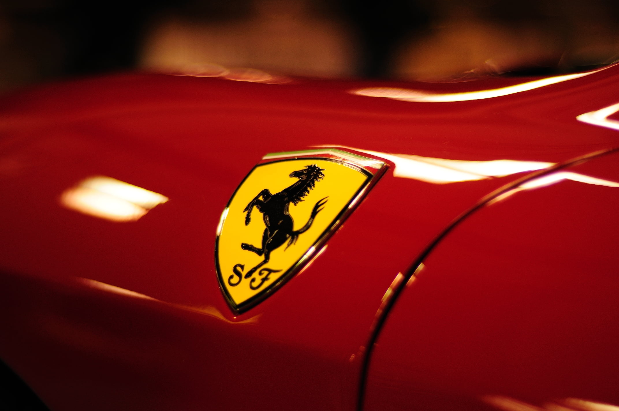 2144x1424 Close up photo of Ferrari emblem HD wallpaper