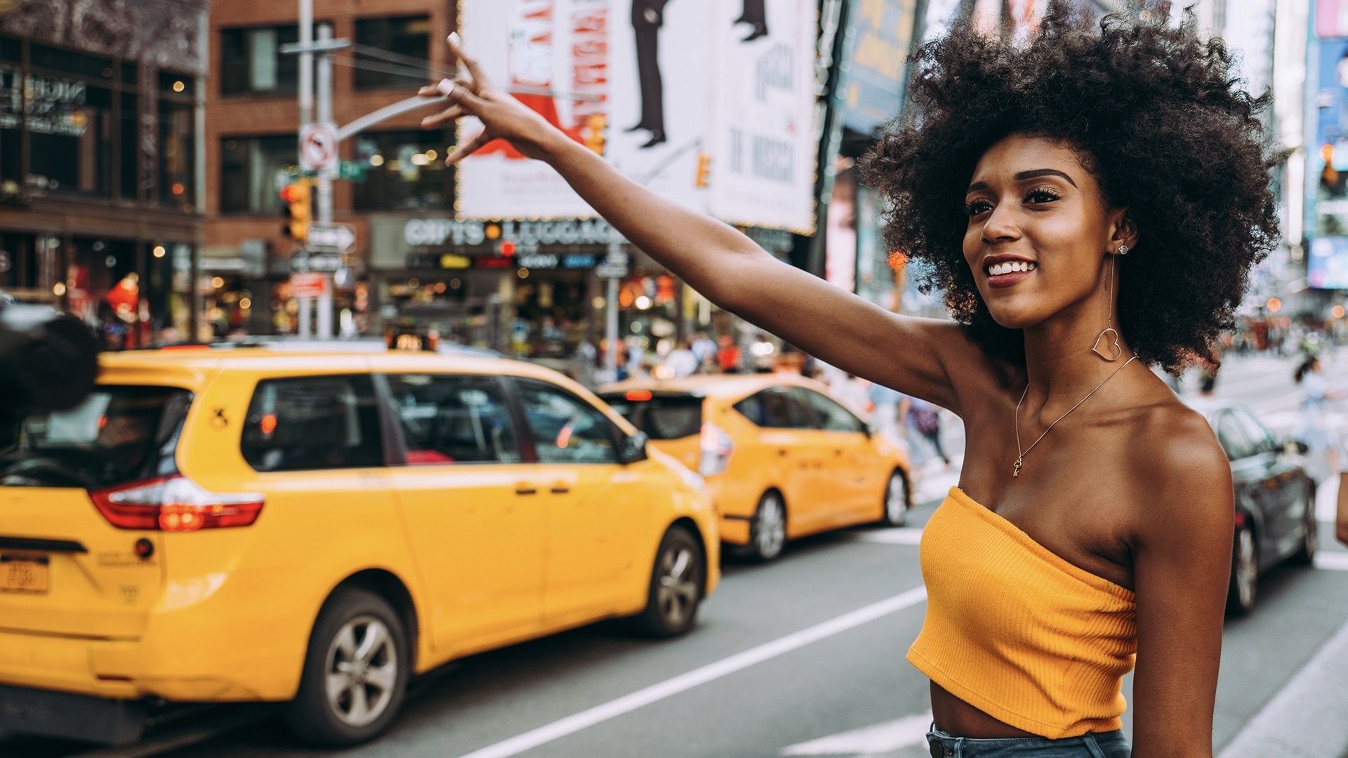 1920x1080 Young beautiful girl walking in Time square, manhattan. Lifestyle concepts about New york