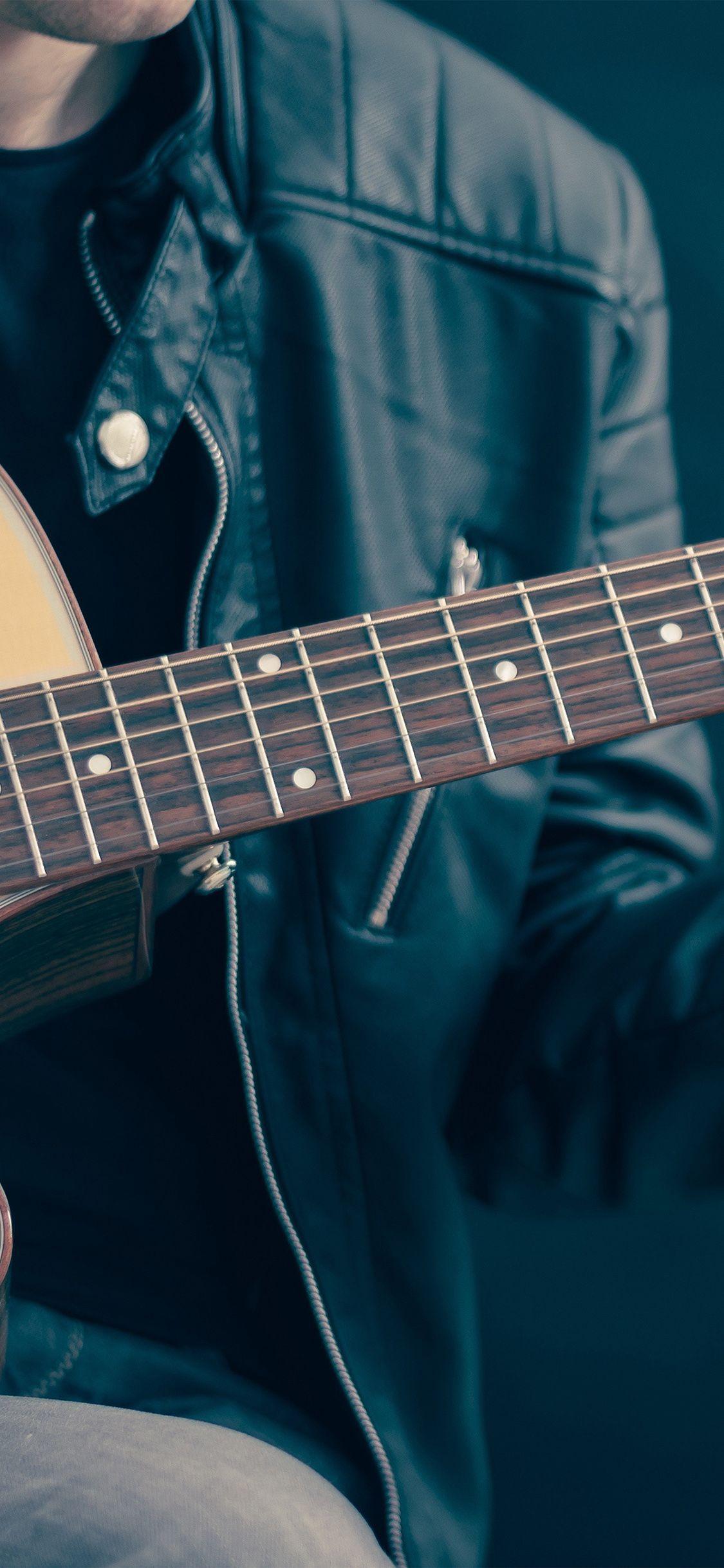 1125x2436 Guitar Classical Music Art Guy Wallpaper
