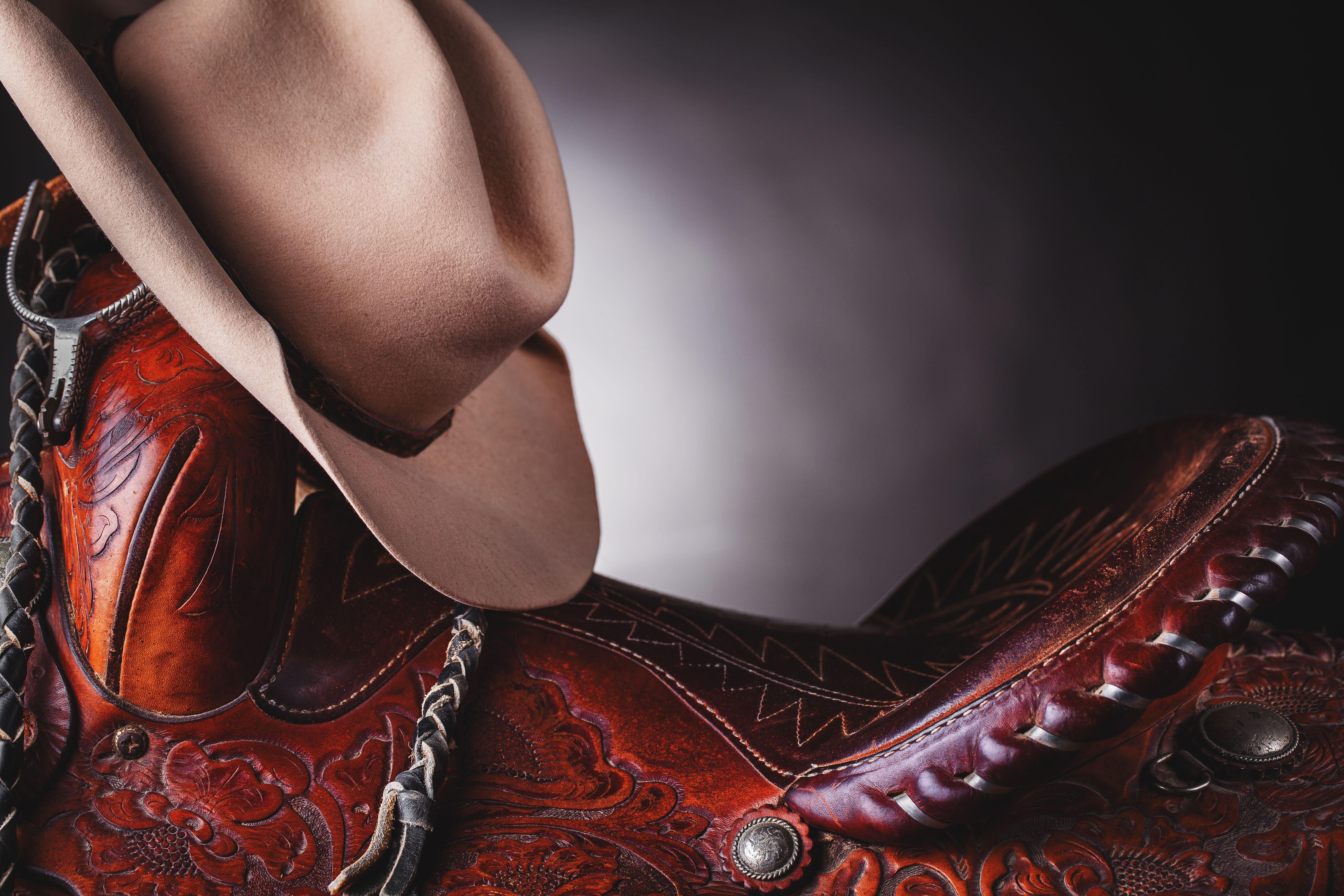 5616x3744 Cowboy Hat on a Saddle 5k Retina Ultra HD Wallpaper