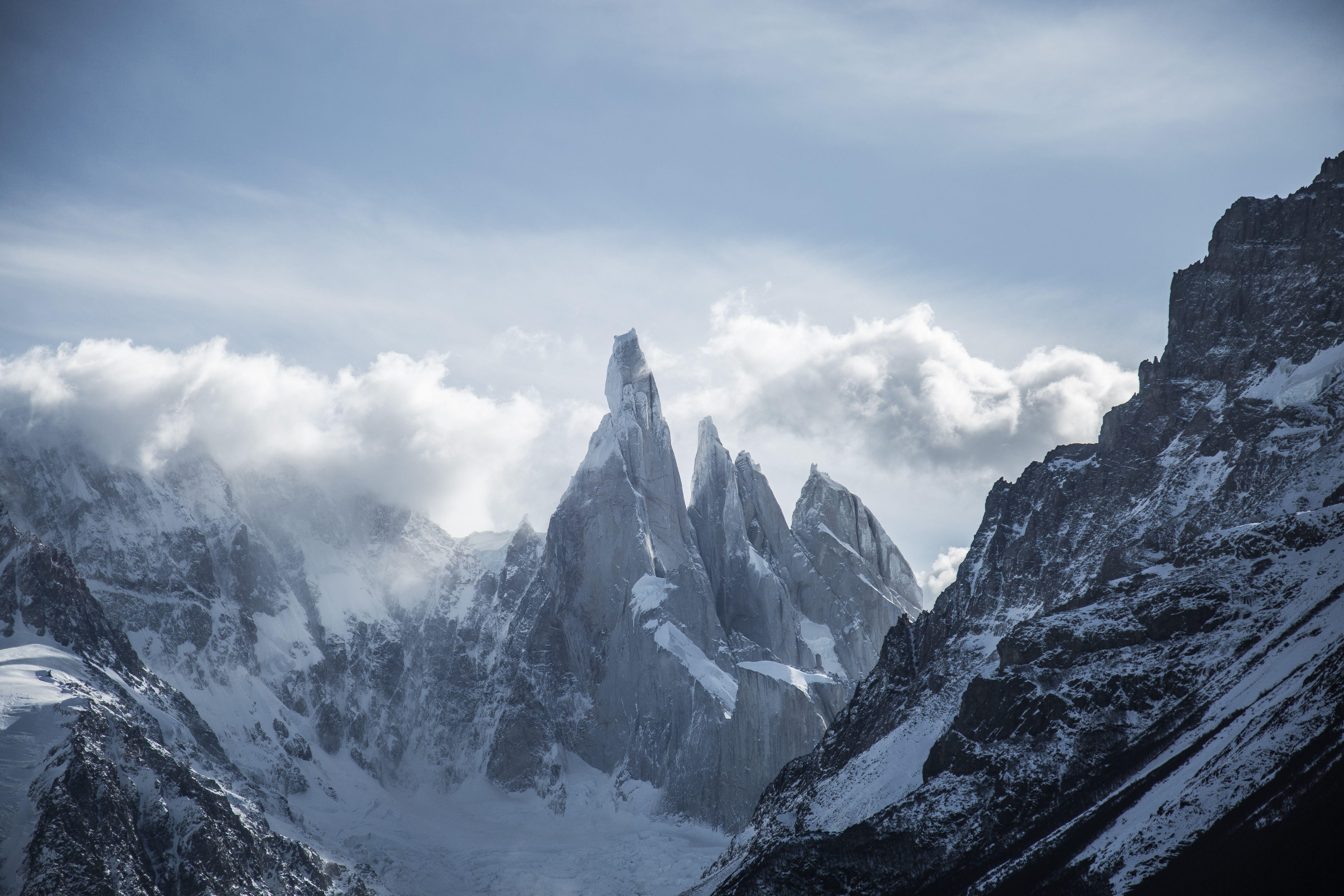 5760x3840 snow mountains under white and blue cloudy sky free image