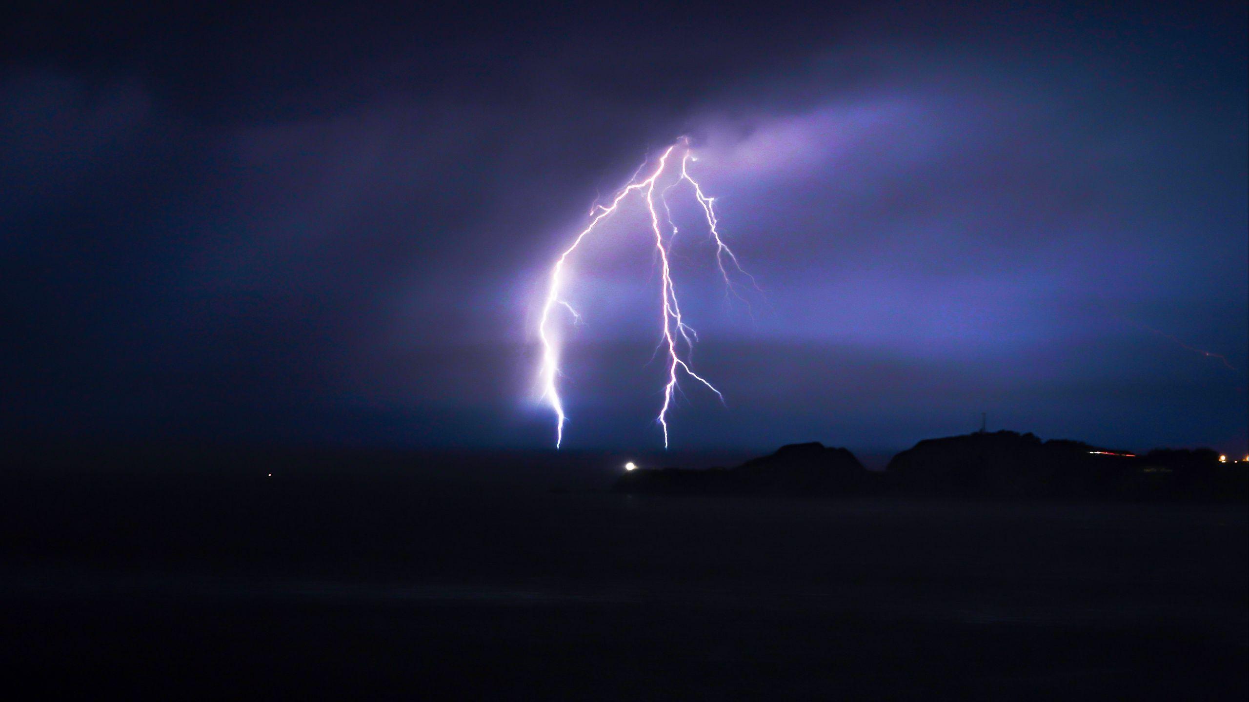 2560x1440 Download wallpaper 2560x1440 lightning, thunderstorm, sky, night widescreen 16:9 HD background