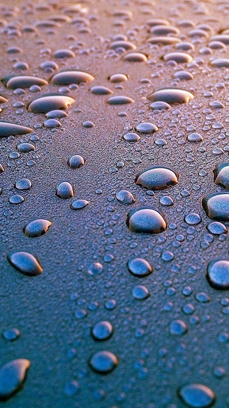 750x1334 water drop rain cold blue pattern background bokeh