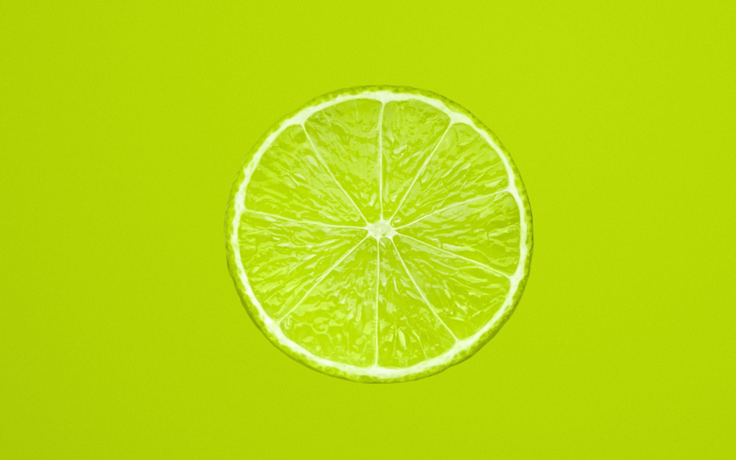 2560x1600 Download wallpaper 2560x1600 lemon, slice, citrus, minimalism, green widescreen 16:10 HD background