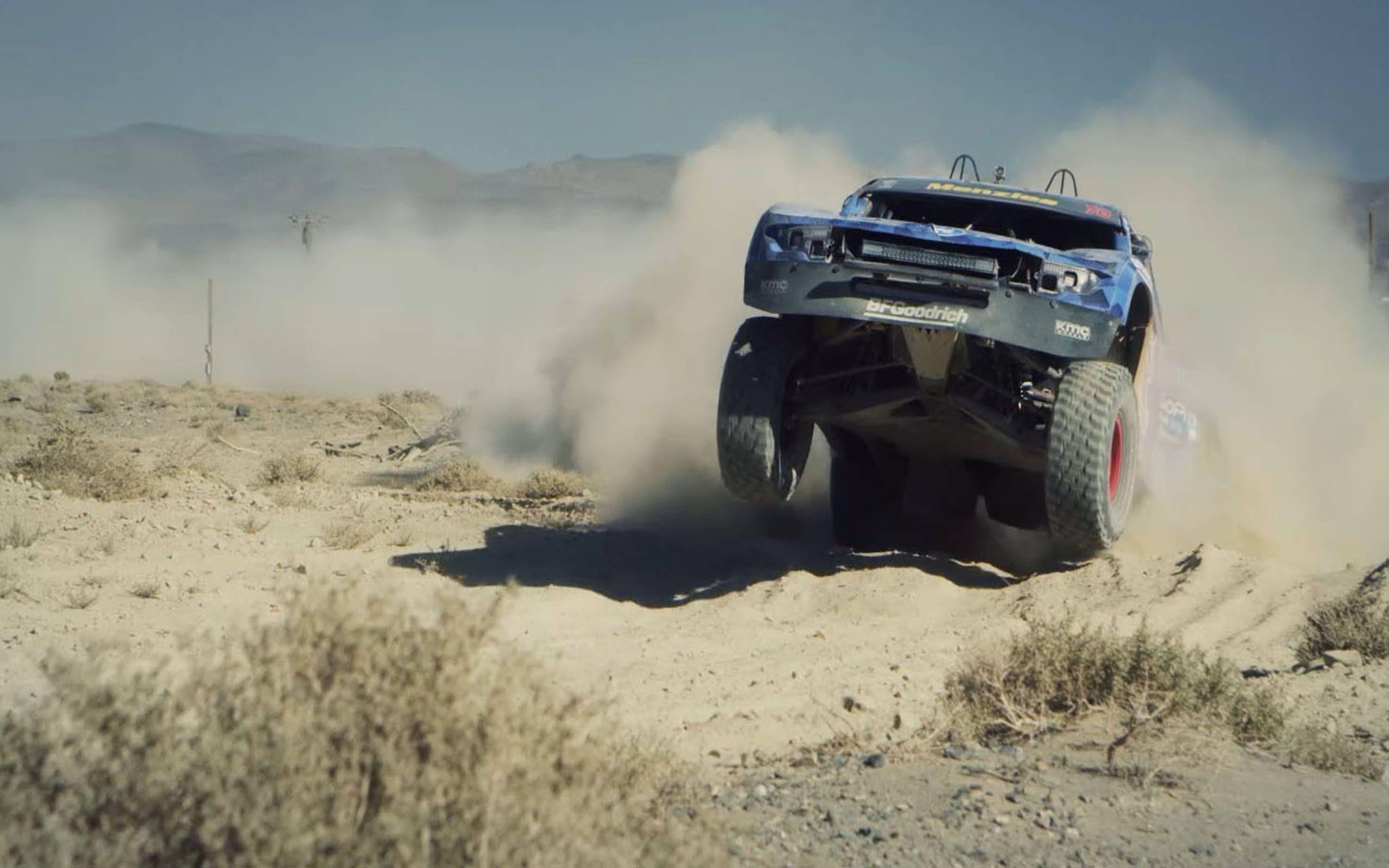 2560x1600 Watch this Ford prototype sports car take on a Raptor Trophy Truck