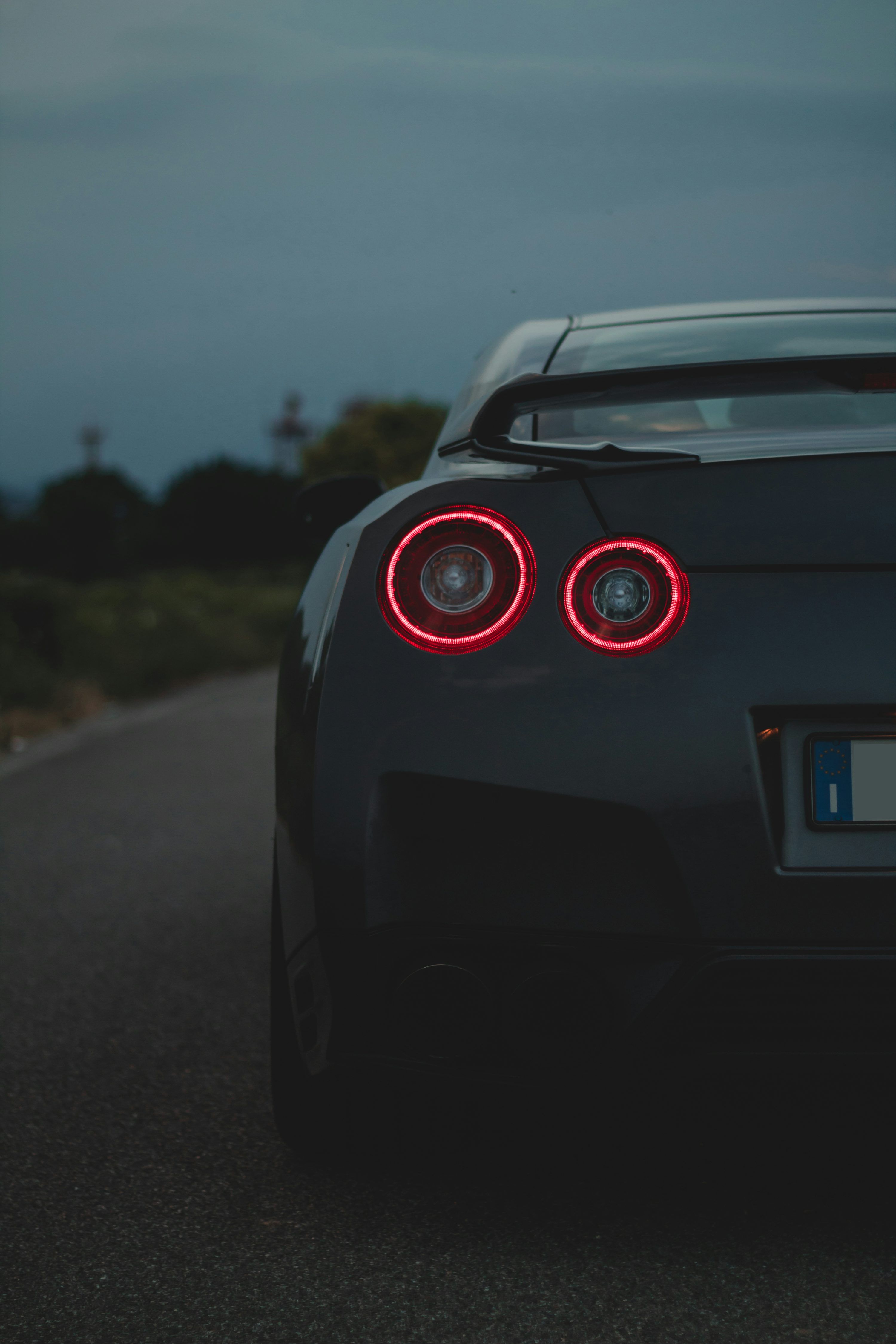 3000x4500 Black Nissan Skyline GTR on road during daytime photo