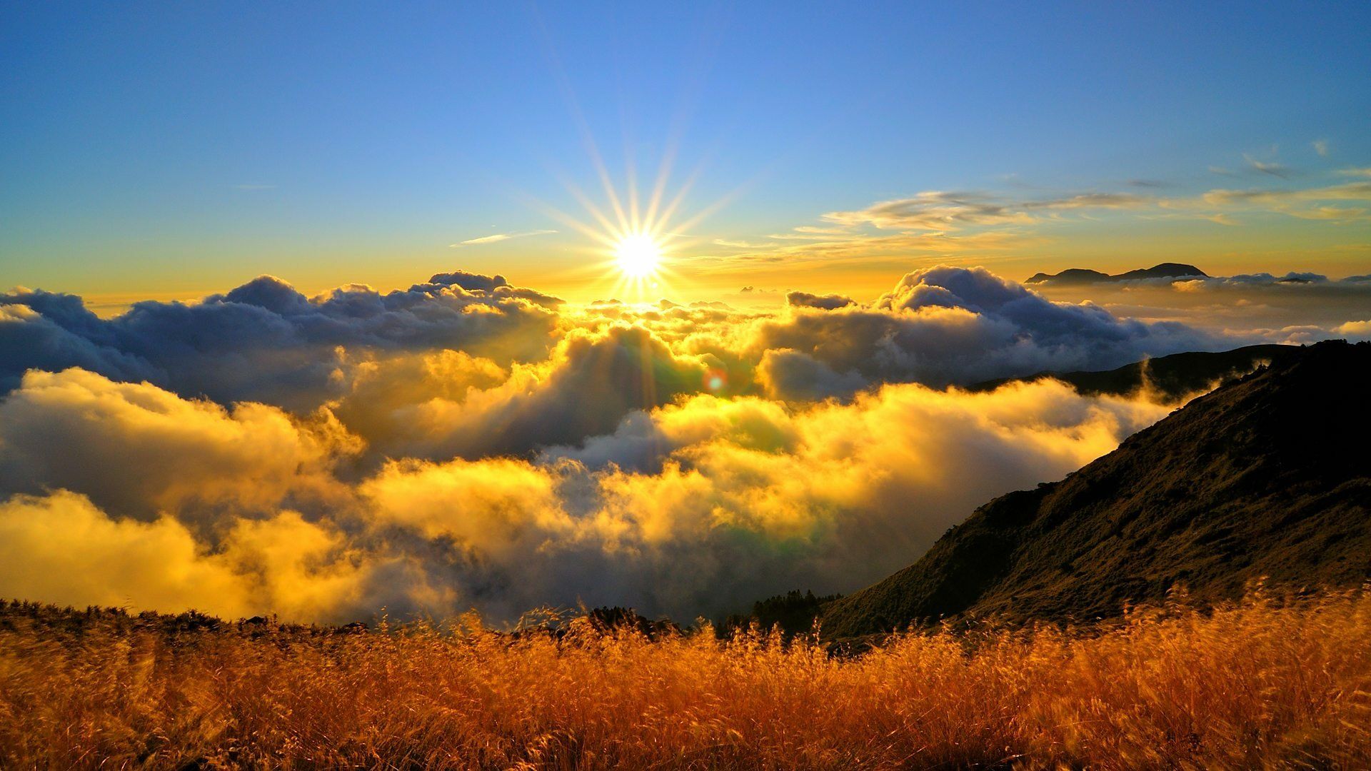 1920x1080 Radiant Sunrise Over Mountain Horizon