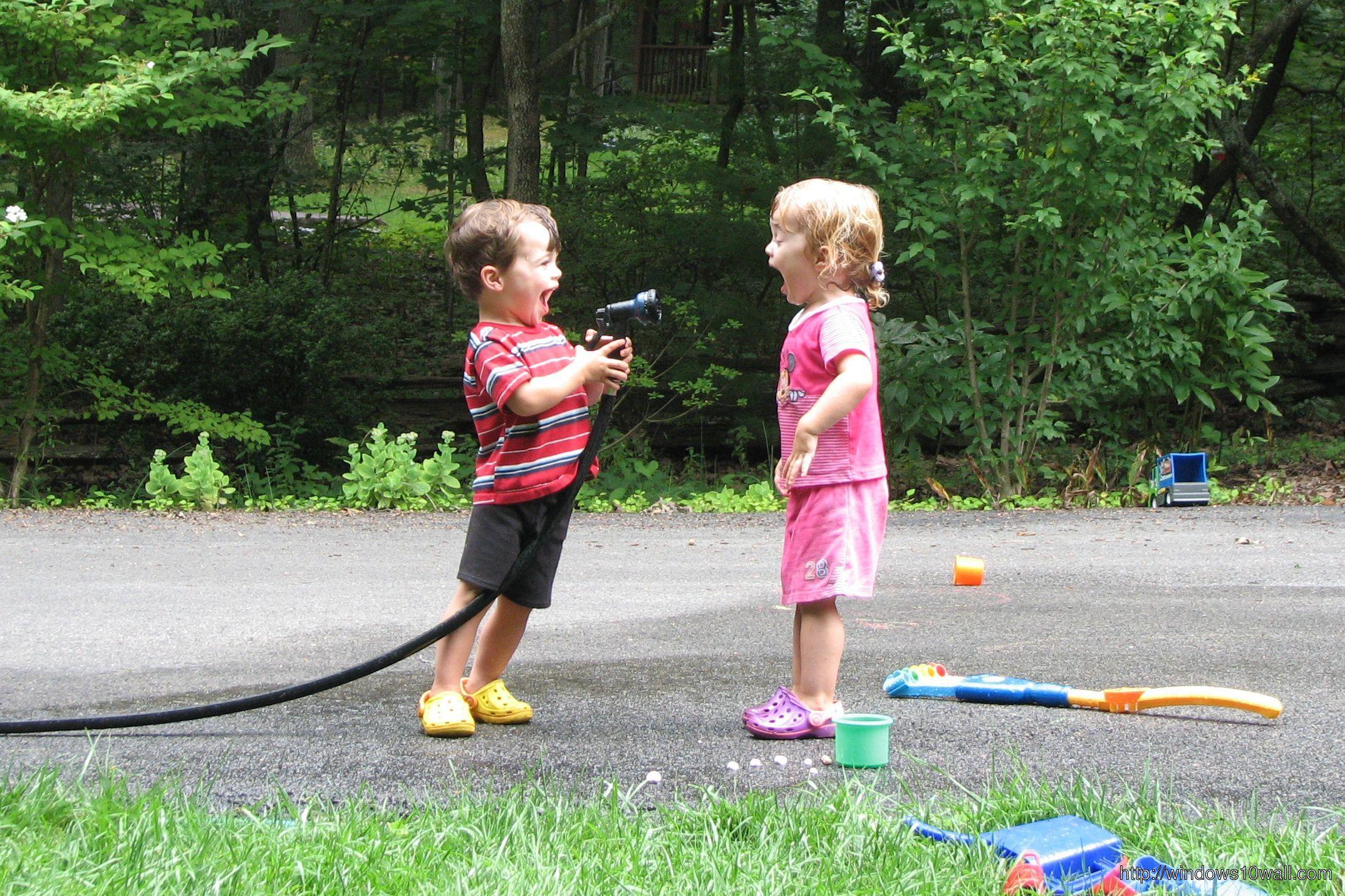 2147x1431 Kids Playing with Water Background Photo