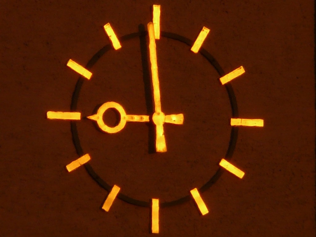 1024x768 A close up of a clock on a wall. Clock time of time