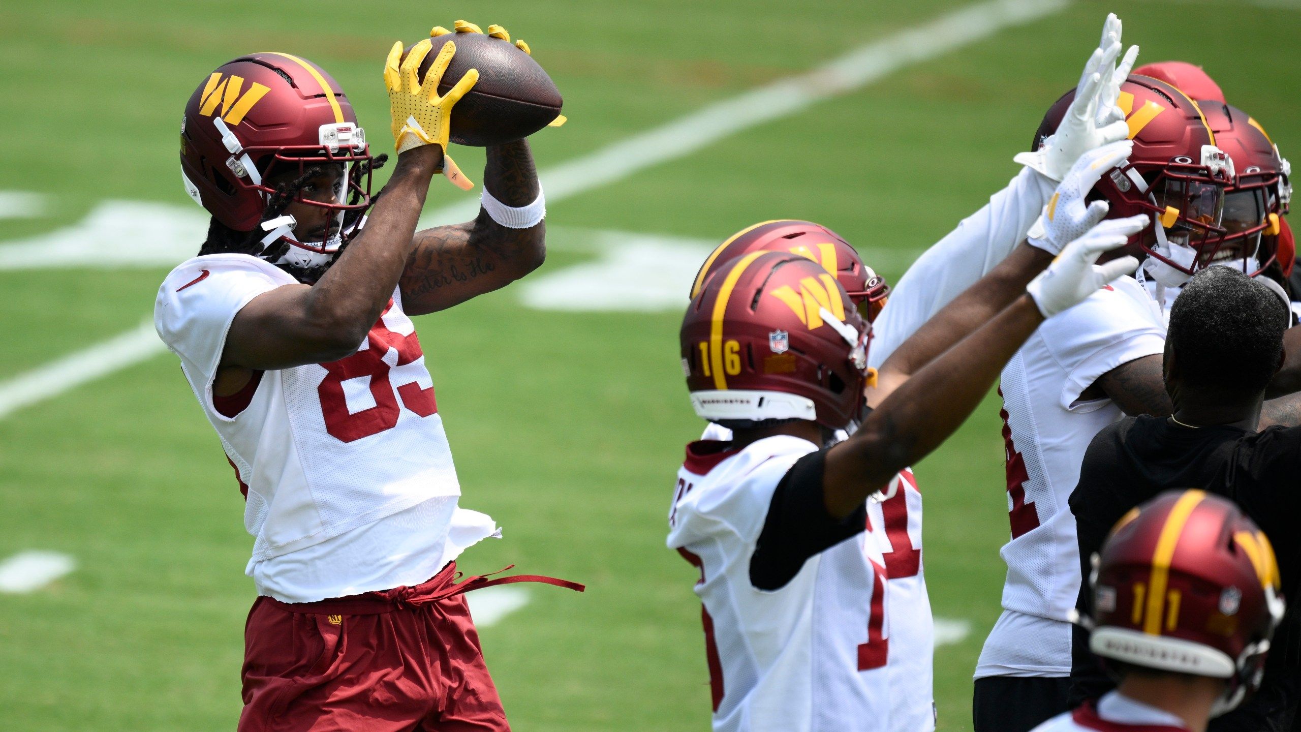 2560x1440 Noah Brown carted off field at Commanders minicamp. Jeremy Reaves gets extended. DC News Now