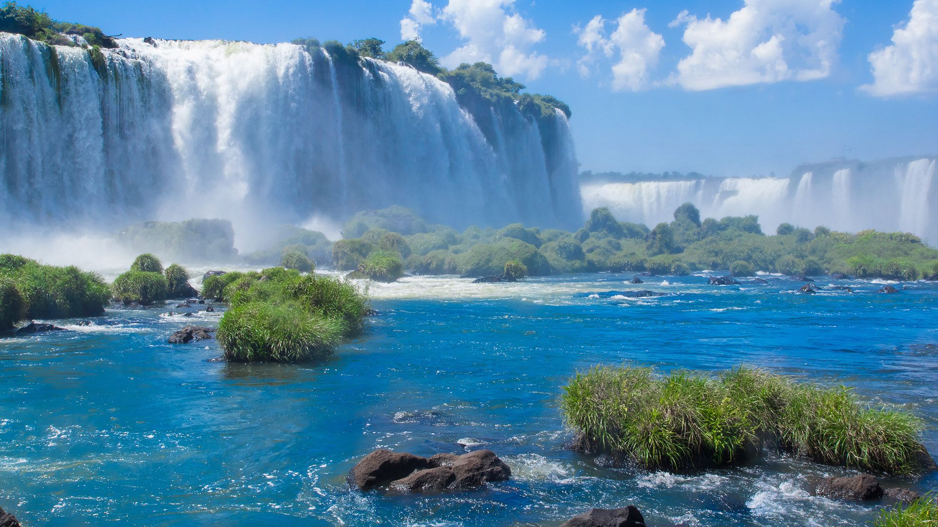 1920x1080 Iguazú Falls or Iguaçu Falls waterfalls of the Iguazu River between Argentina and Brazil. Windows Spotlight Image