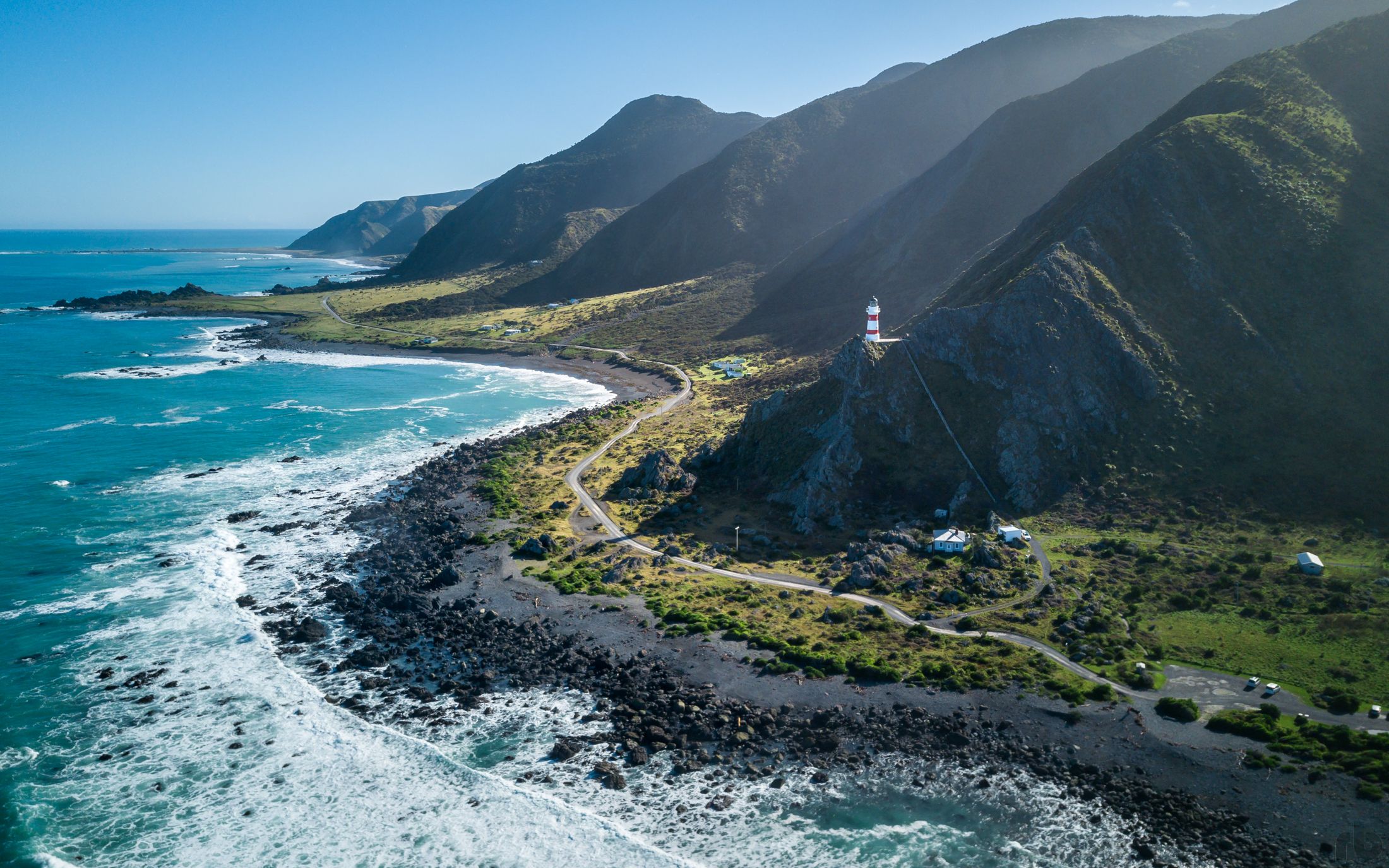 2200x1375 Download Horizon Foam Ocean Lighthouse Road Mountain Landscape New Zealand North Island (New Zealand) Nature Coastline HD Wallpaperx1375