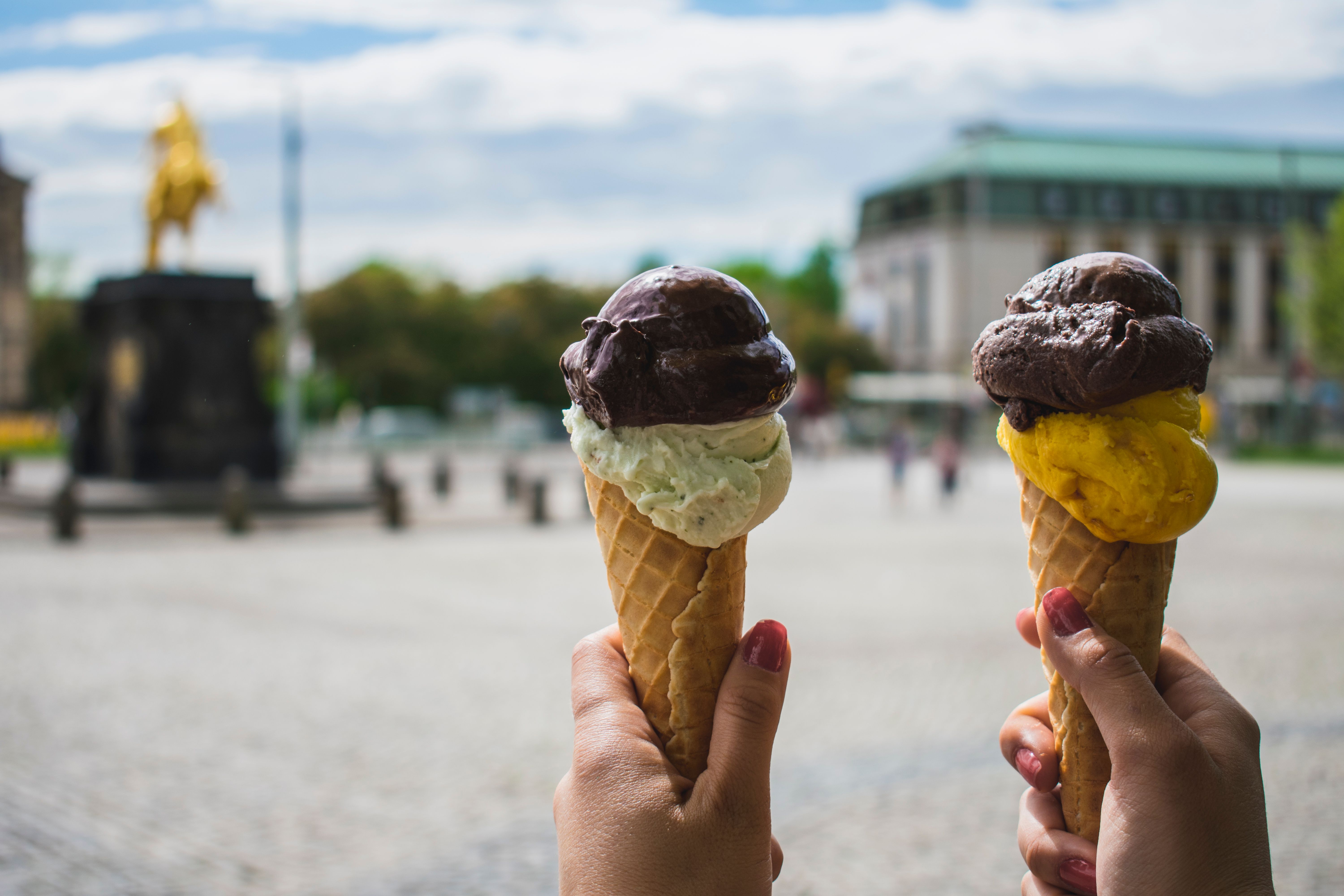 6000x4000 Photography of Person Holding Two Ice Cream · Free