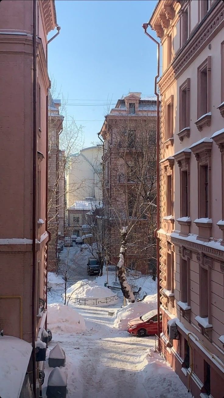 736x1308 Winter Wonderland: A Snowy Alleyway in the City. Winter street wallpaper, Russia snow wallpaper, Moscow
