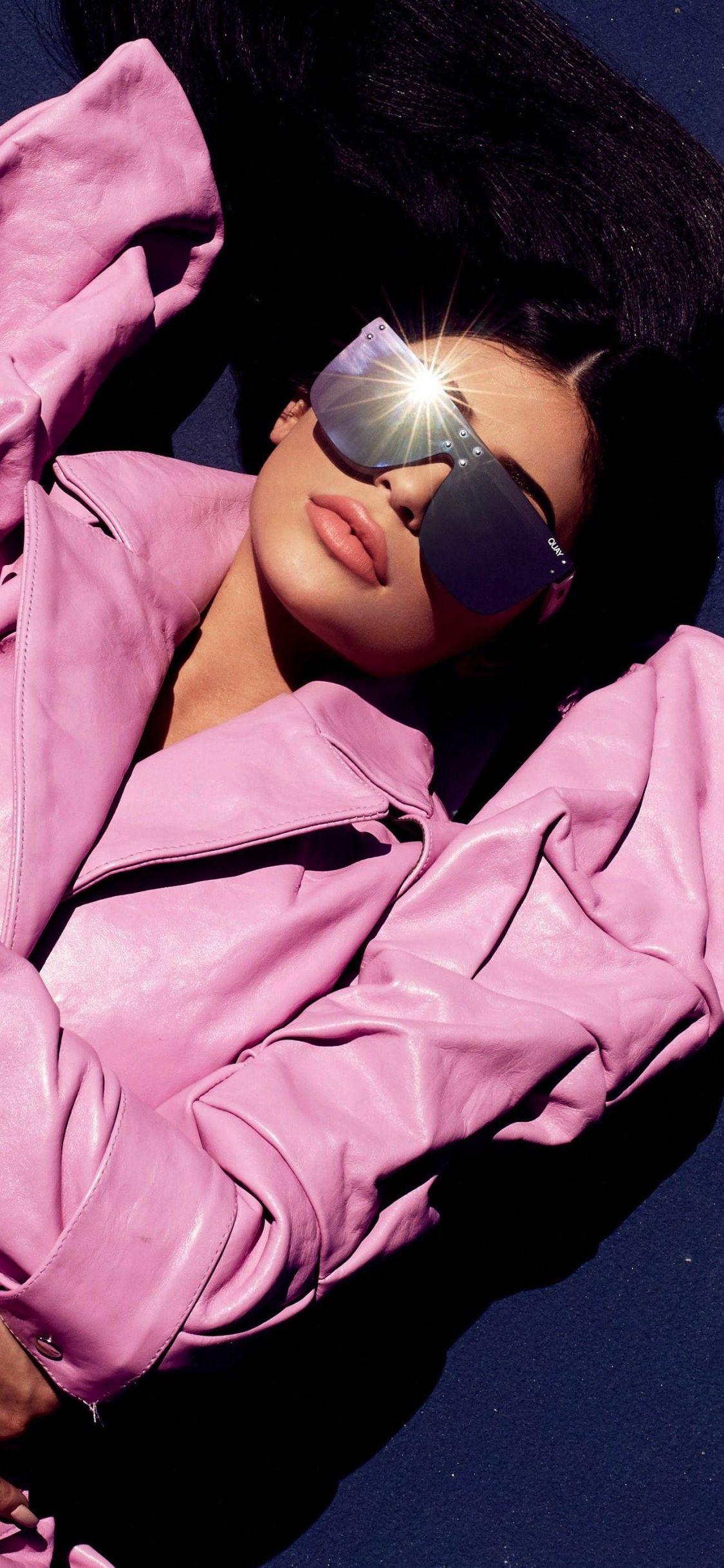 1125x2436 Download 1125x2436 wallpaper kylie jenner, pink dress, sunglasses, lying down, iphone x 1125x2436 HD image, background, 2673