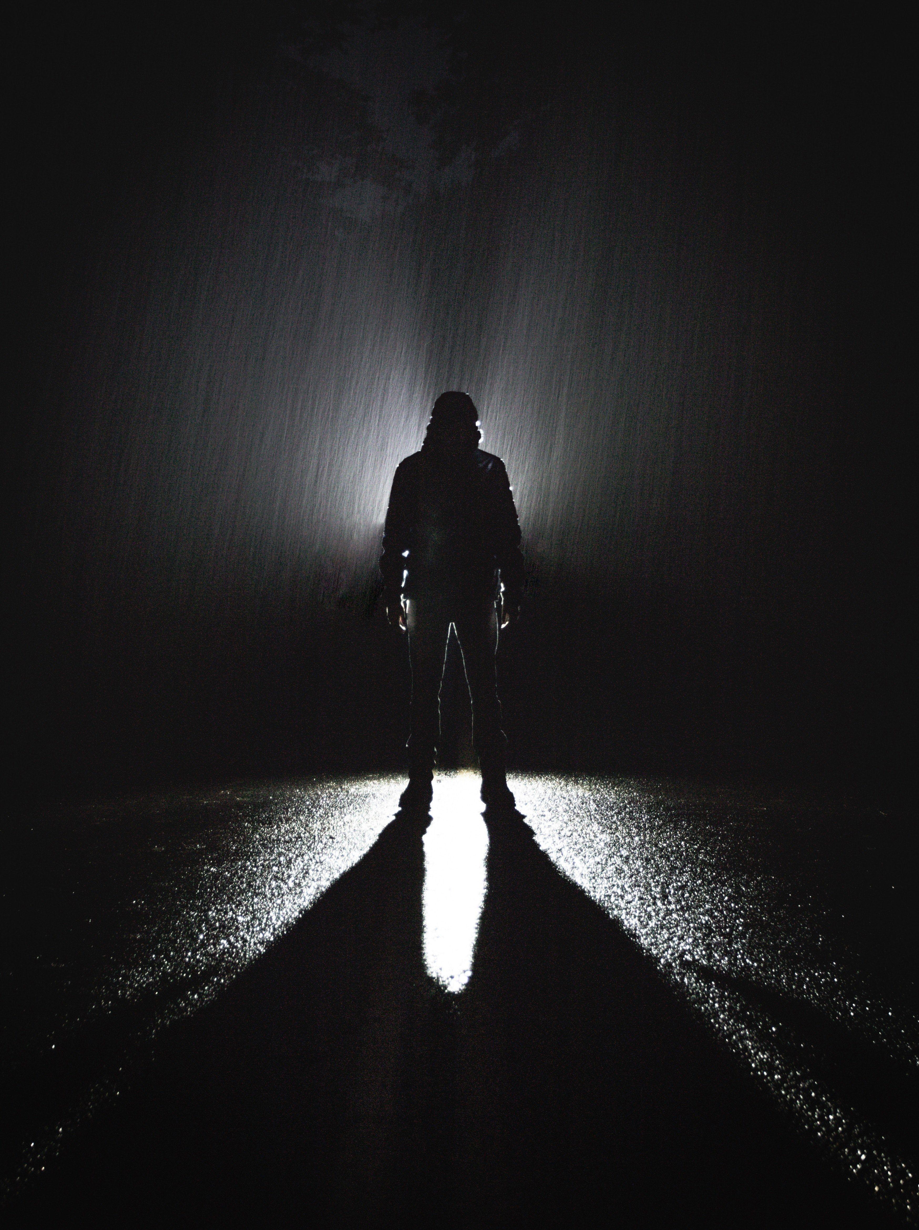 3497x4677 Wallpaper / the shadow of a man walking down a street at night, _lost in the shadow of darkness 4k wallpaper free download