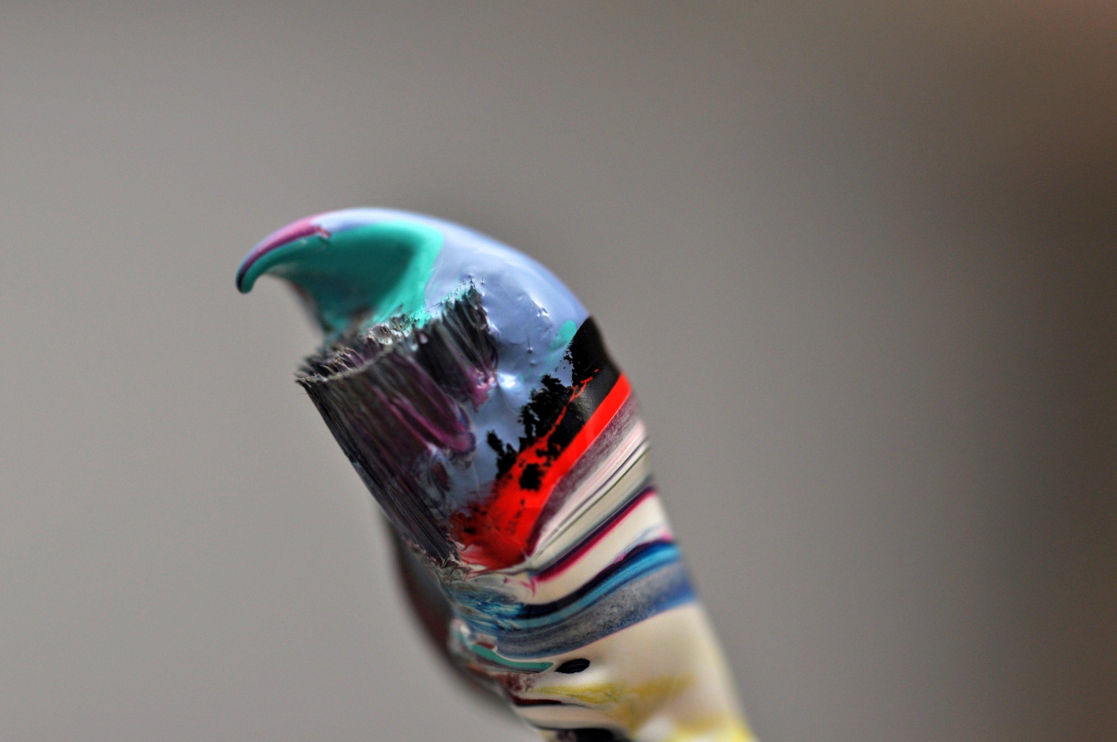 3840x2550 Wallpaper / colorful layers of paint swirl around the bristles of an artists paint brush, color your world 4k wallpaper