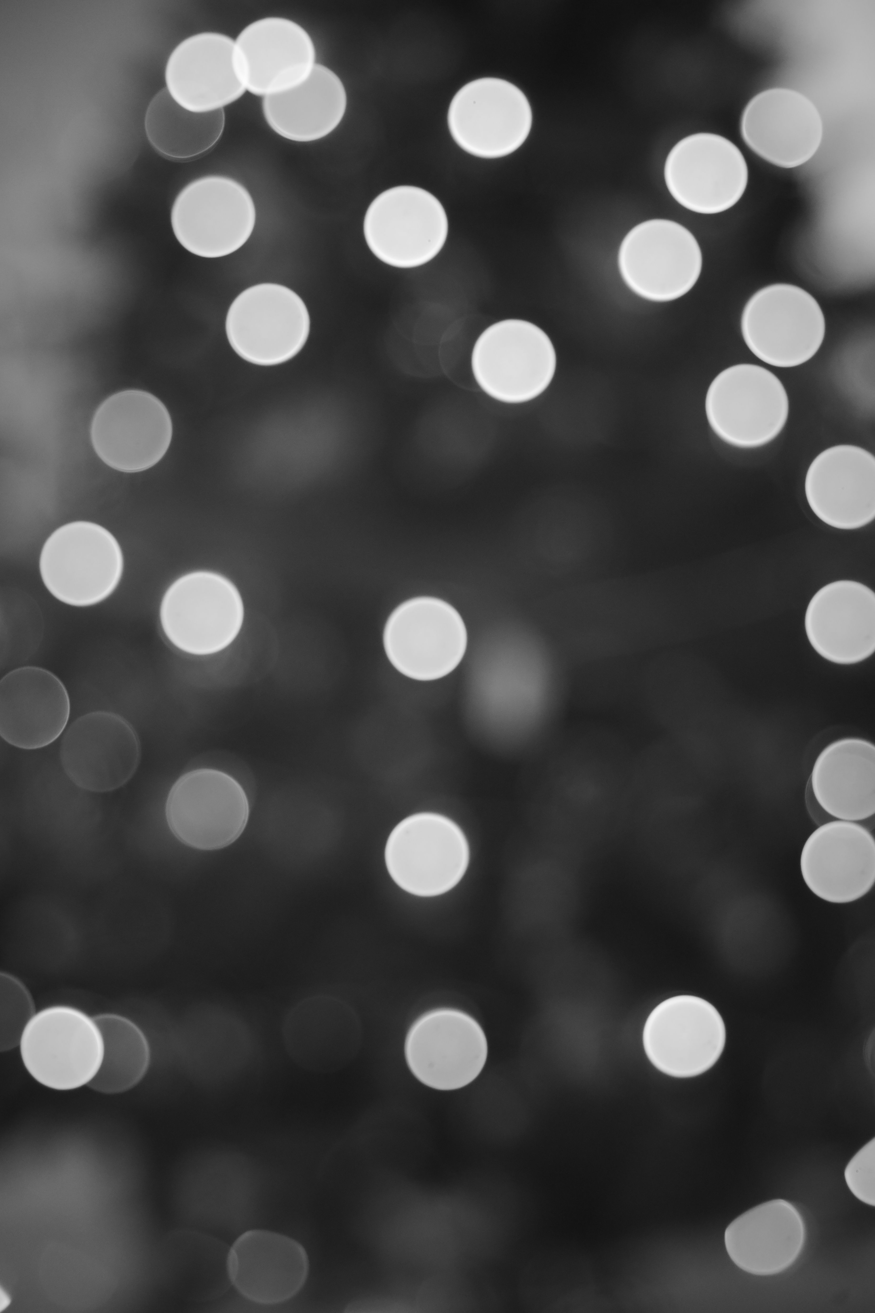 3680x5520 Black and White Bokeh Lights Background · Free
