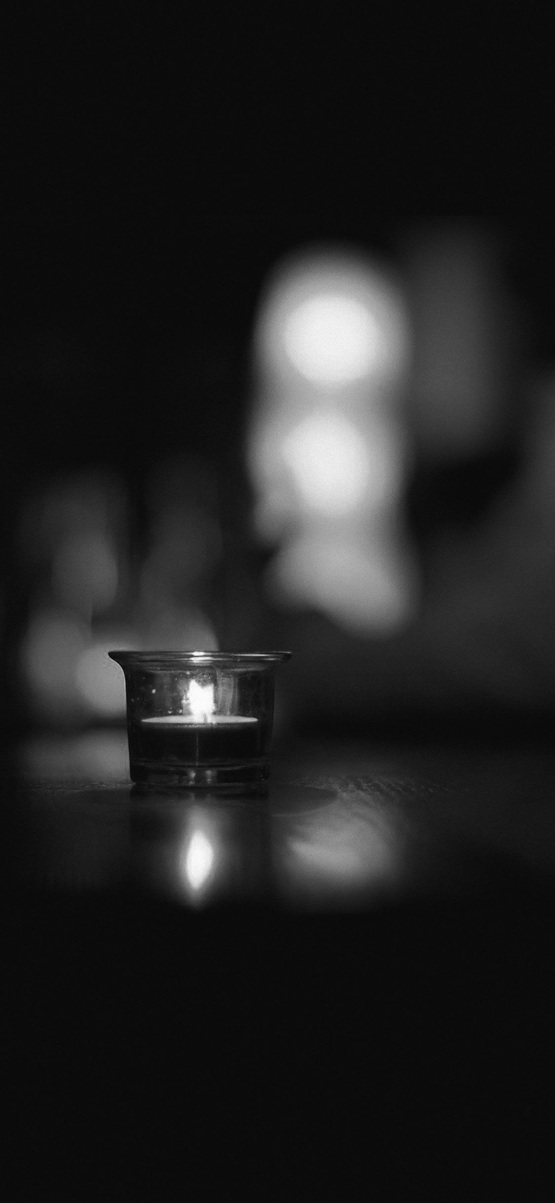 1125x2436 Candle light night bokeh iPhone X Wallpaper Free Download