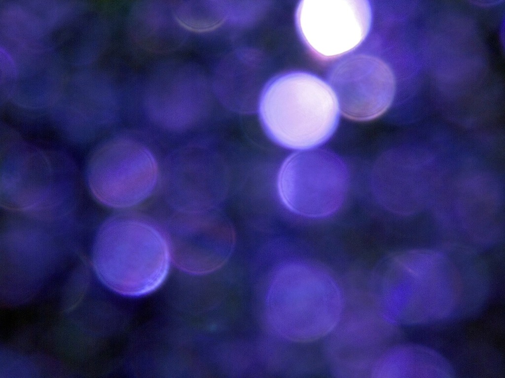 1024x768 A close up of a purple and blue background. Bokeh