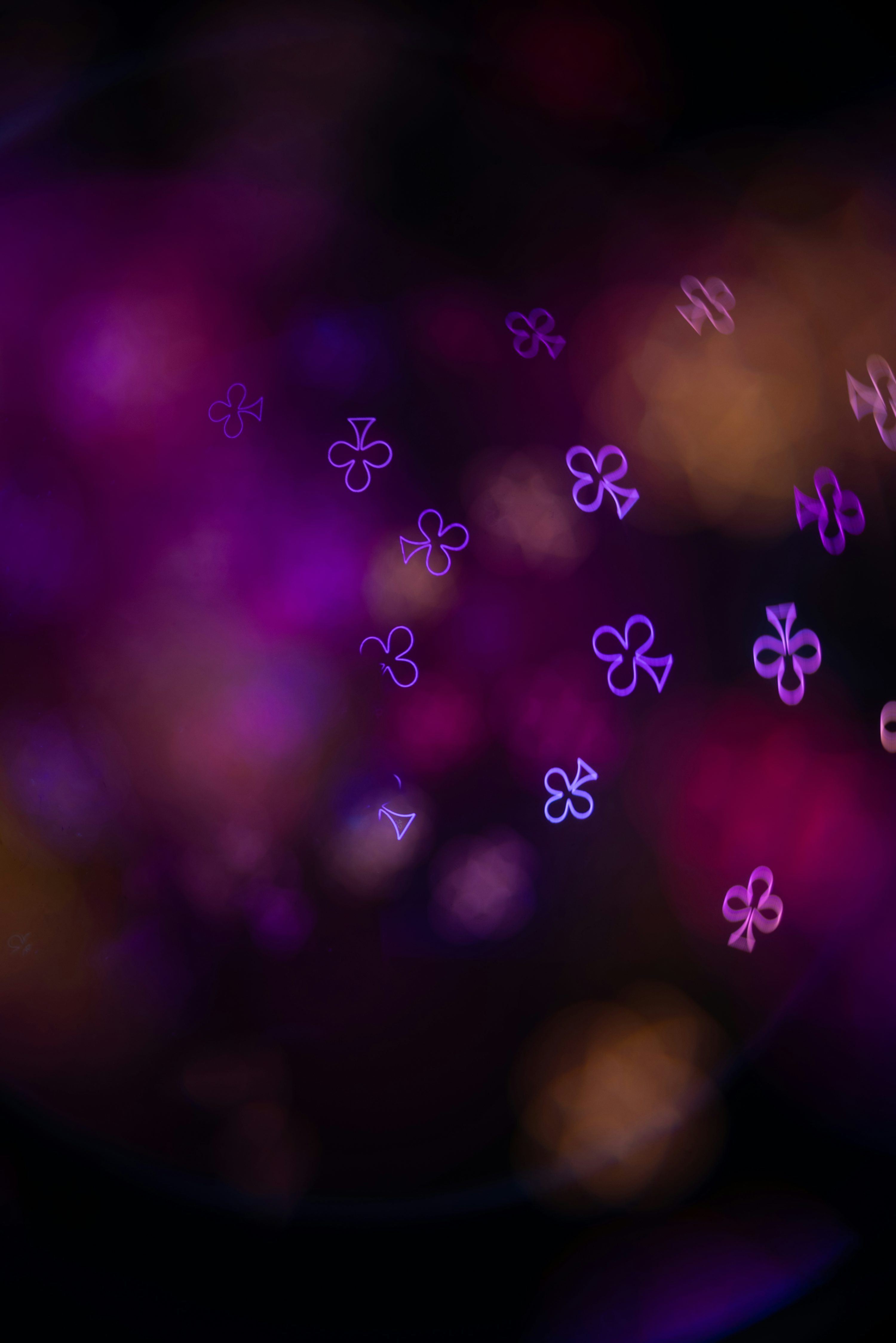 3000x4494 Abstract purple and pink bokeh with clover shapes photo