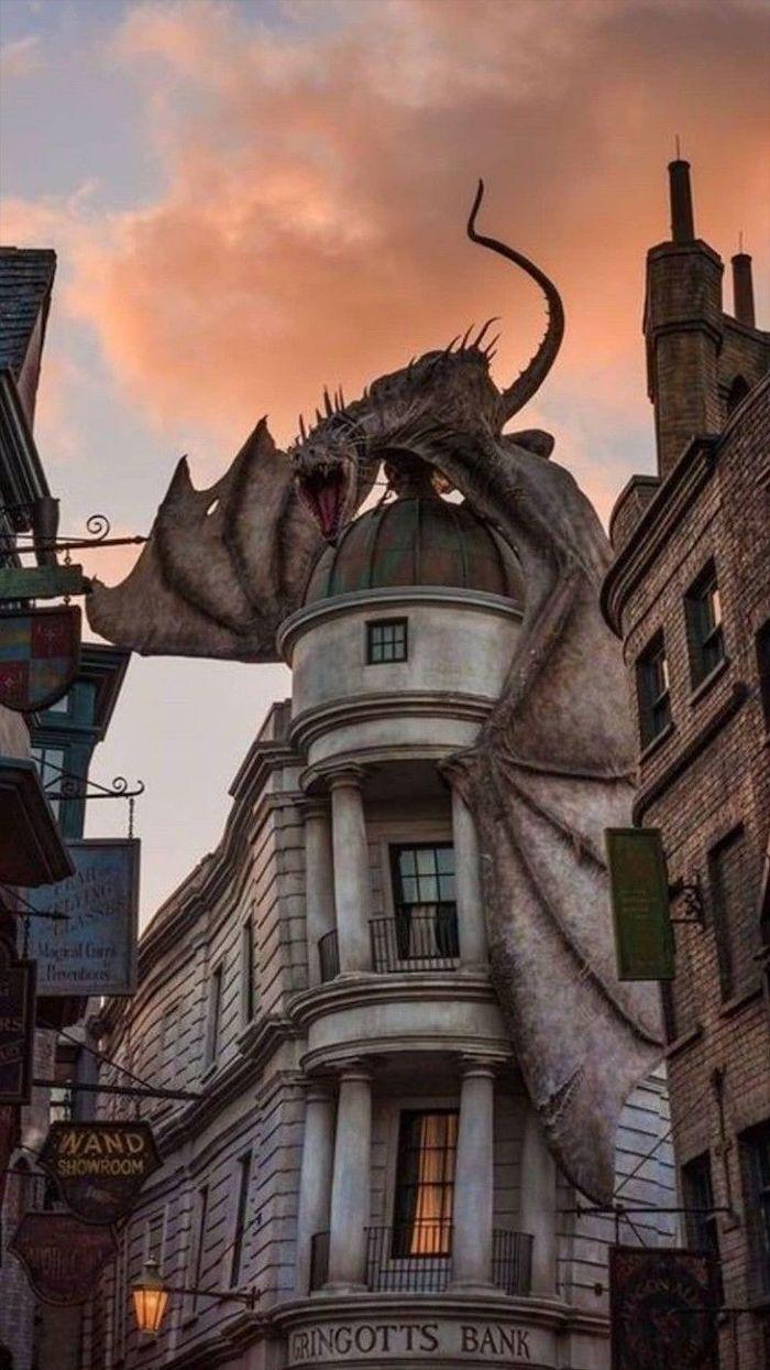 700x1244 Dragon Standing On Top Of Gringotts Bank Harry Potter Phone Background Still From The Movie. Harry Potter, Harry Potter Memes, Harry Potter Wallpaper