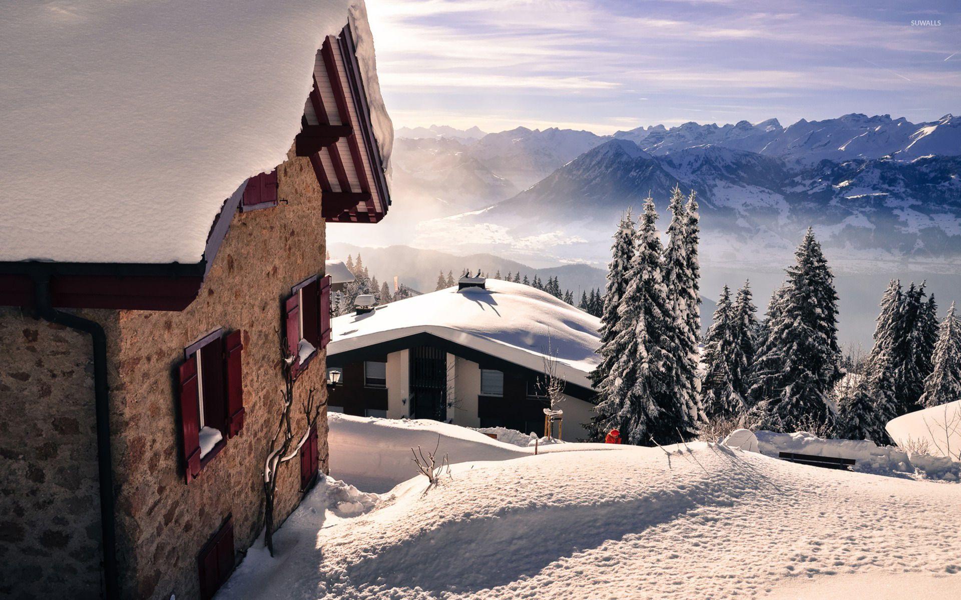 1920x1200 Holiday houses on a snowy mountain top wallpaper wallpaper