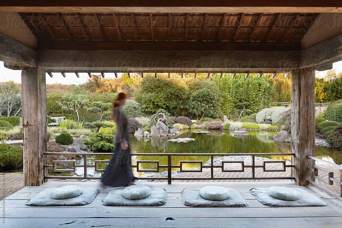 1200x800 Woman walking in Japanese meditation garden by Trinette Reed, Japanese