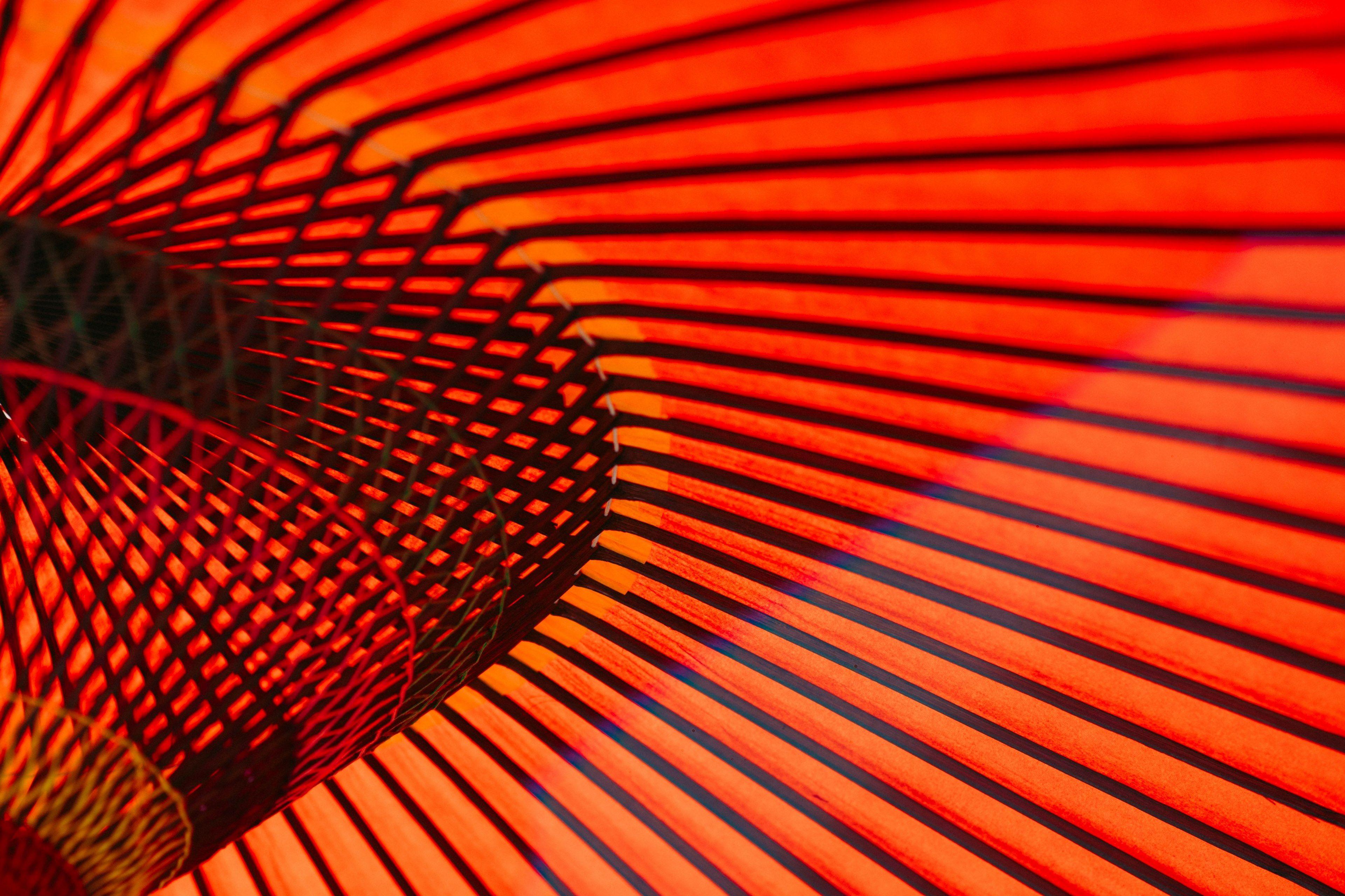 3840x2560 Wallpaper / an abstract photo of orange neon lines and rails along the walls in an asakusa building, japan umbrella 4k wallpaper