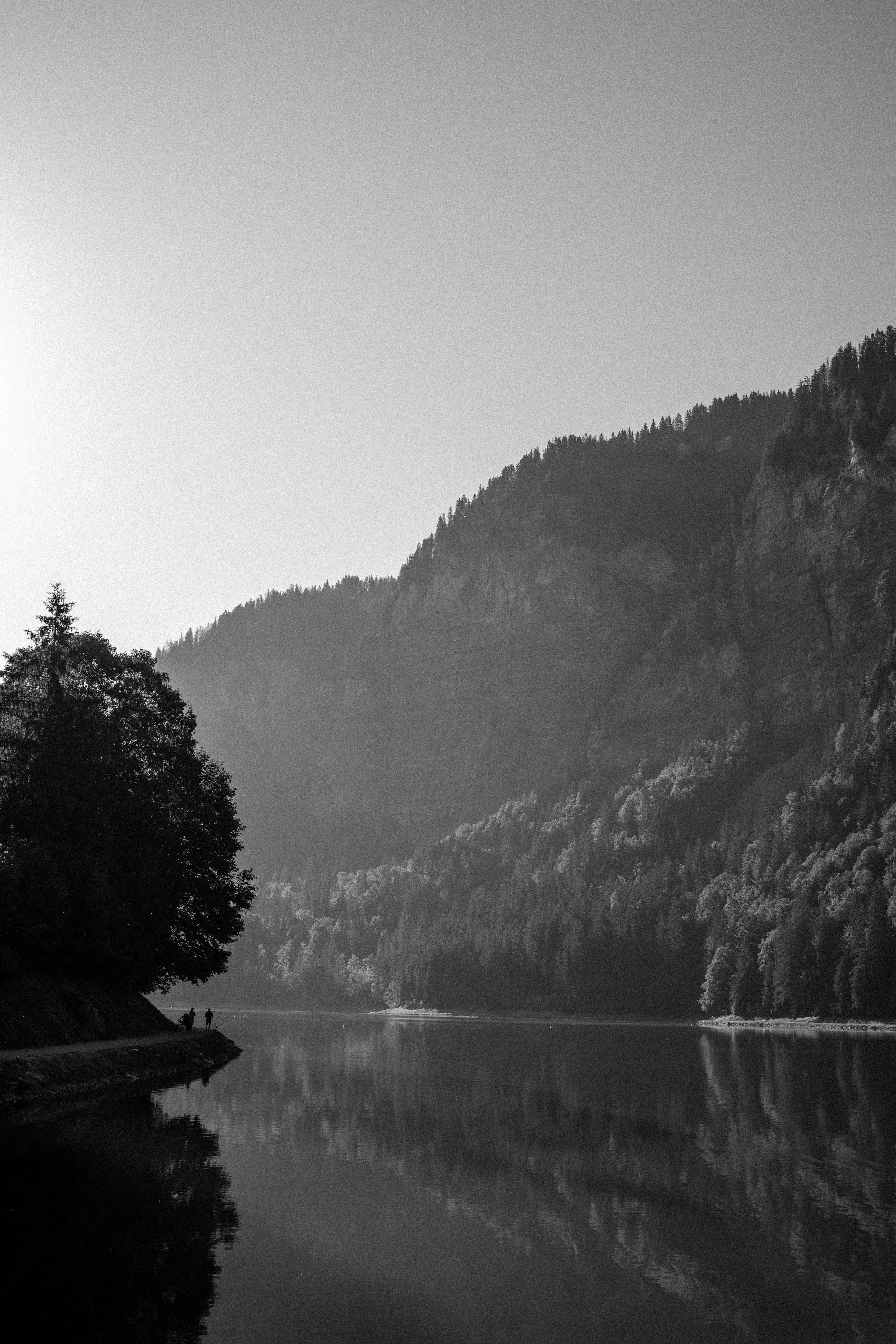 3000x4500 A black and white photo of a mountain lake photo
