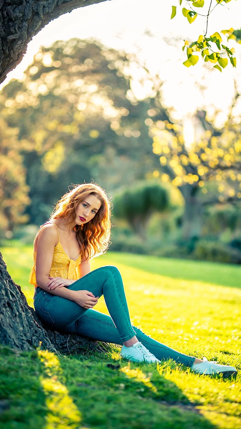 800x1422 Shadow, cute, garden, girl, jeans, lovely, pretty, red hair, tree, yellow shirt, HD phone wallpaper