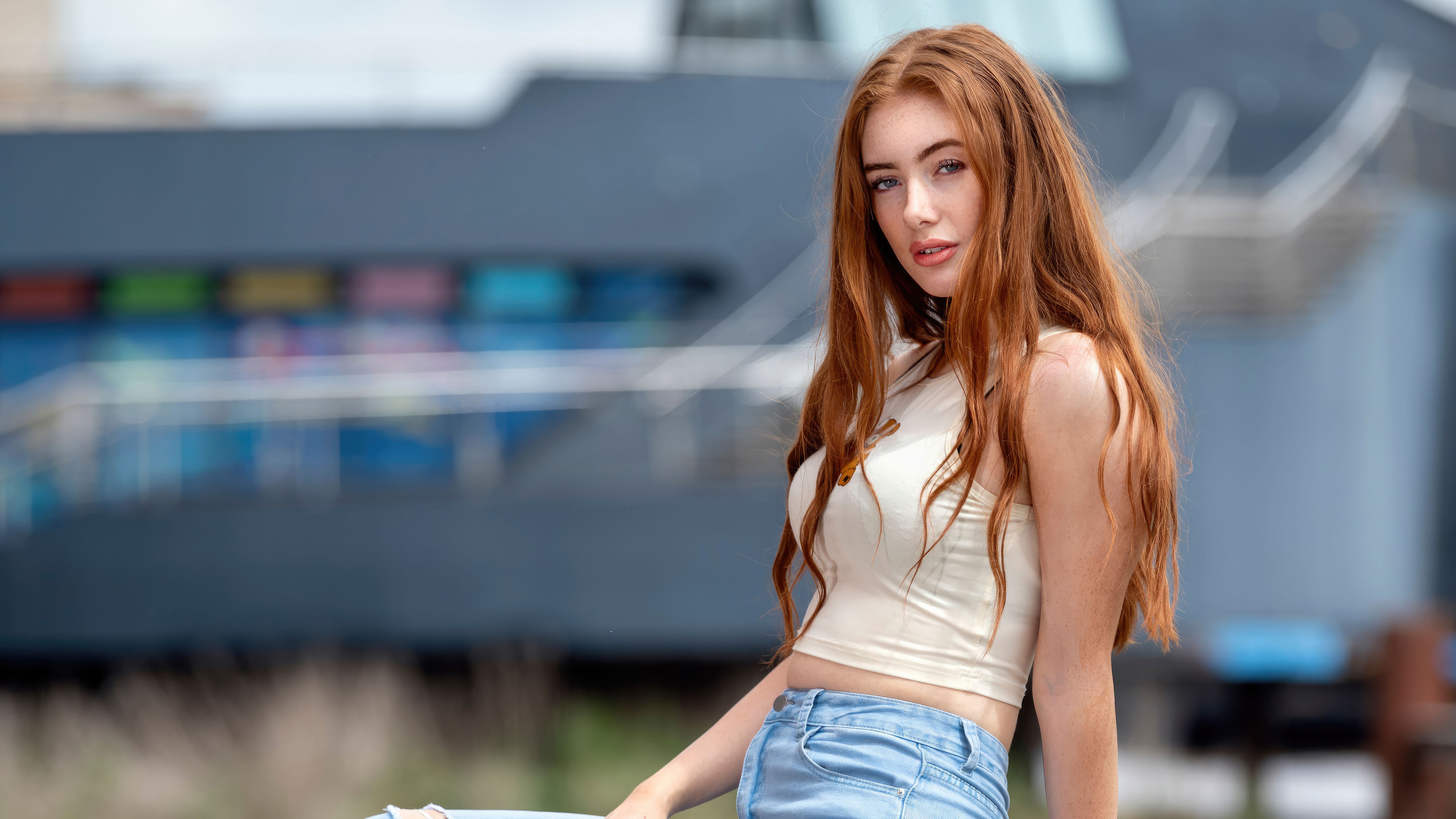 5120x2880 Beautiful Girl Poses In Jeans Locking Eyes With The Viewer Wallpaper, HD Girls Wallpaper, 4k Wallpaper, Image, Background, Photos and Picture