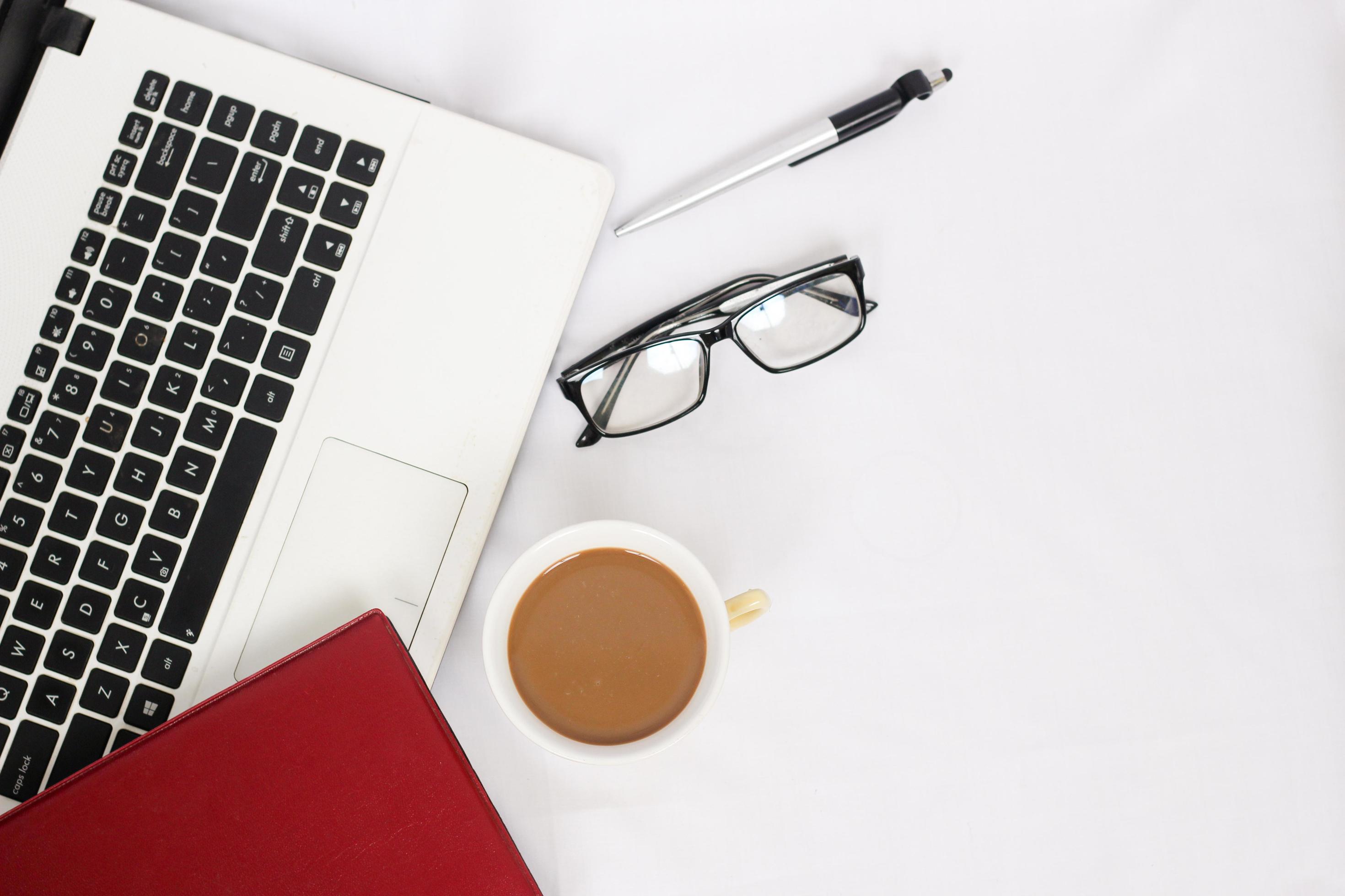 2940x1960 work desk with a cup of coffee isolated on white background