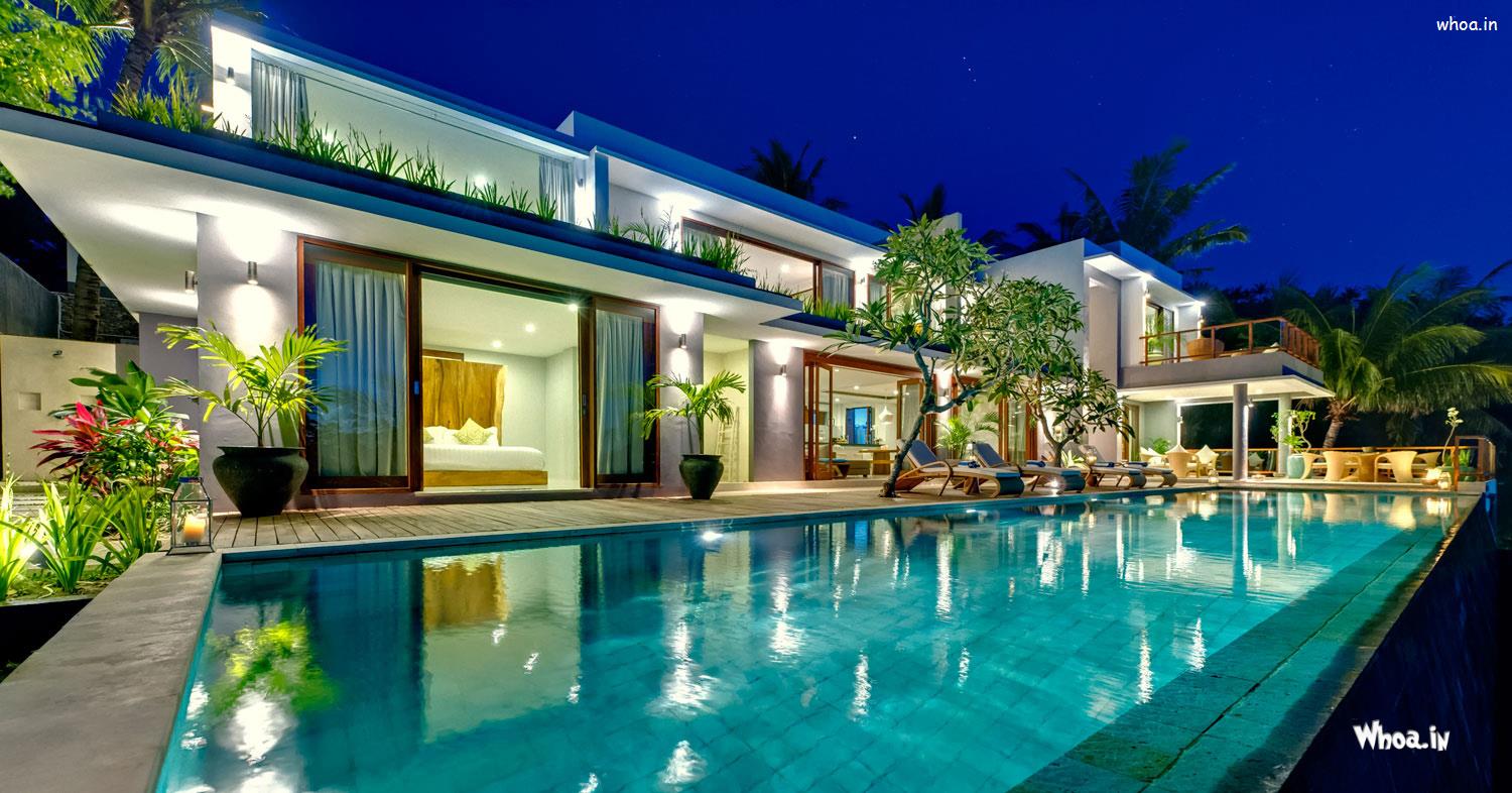 1500x786 Amazing House Night View With Beautiful Swimming Pool Wallpaper