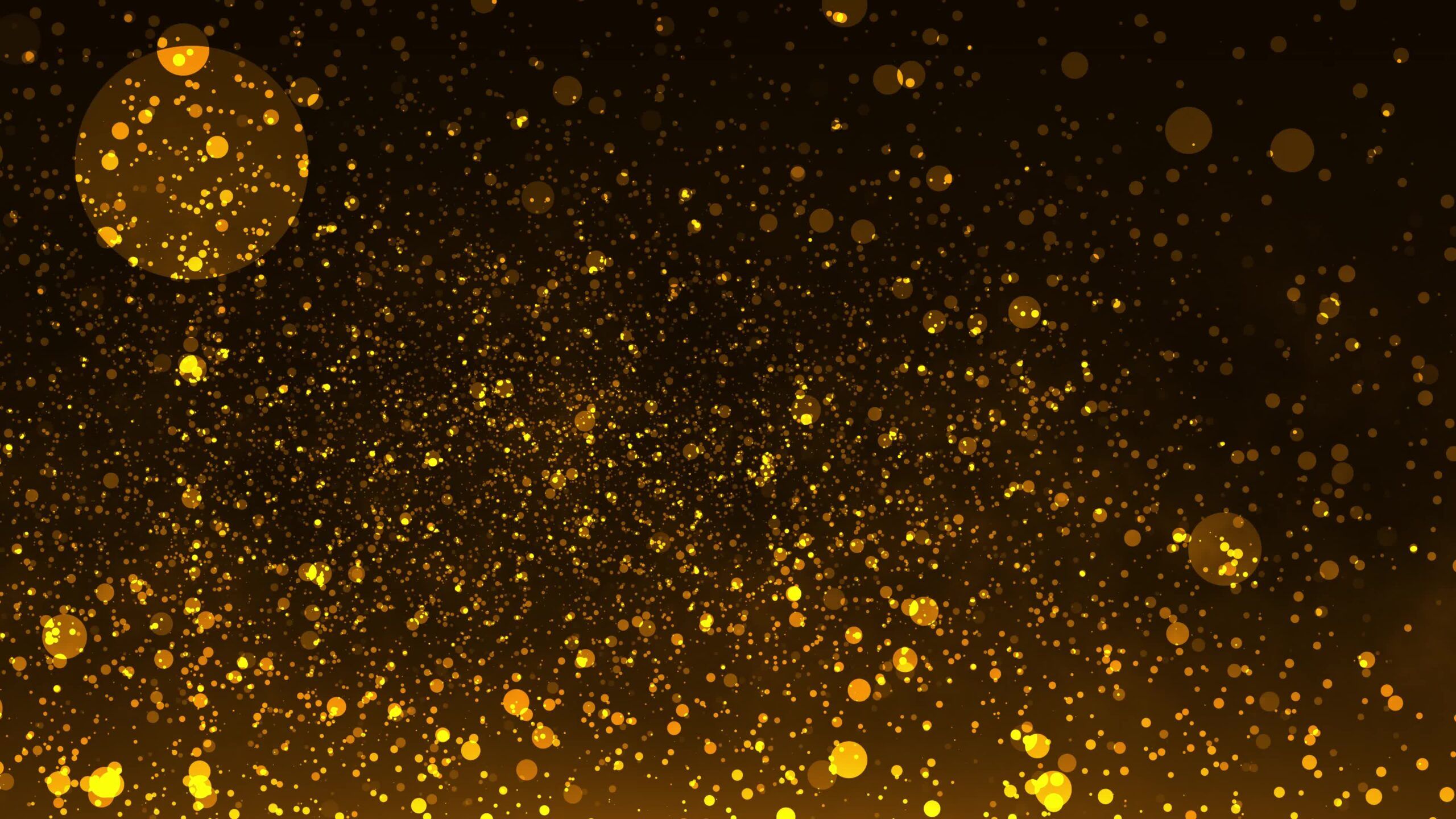 2560x1440 Yellow particles on a black background