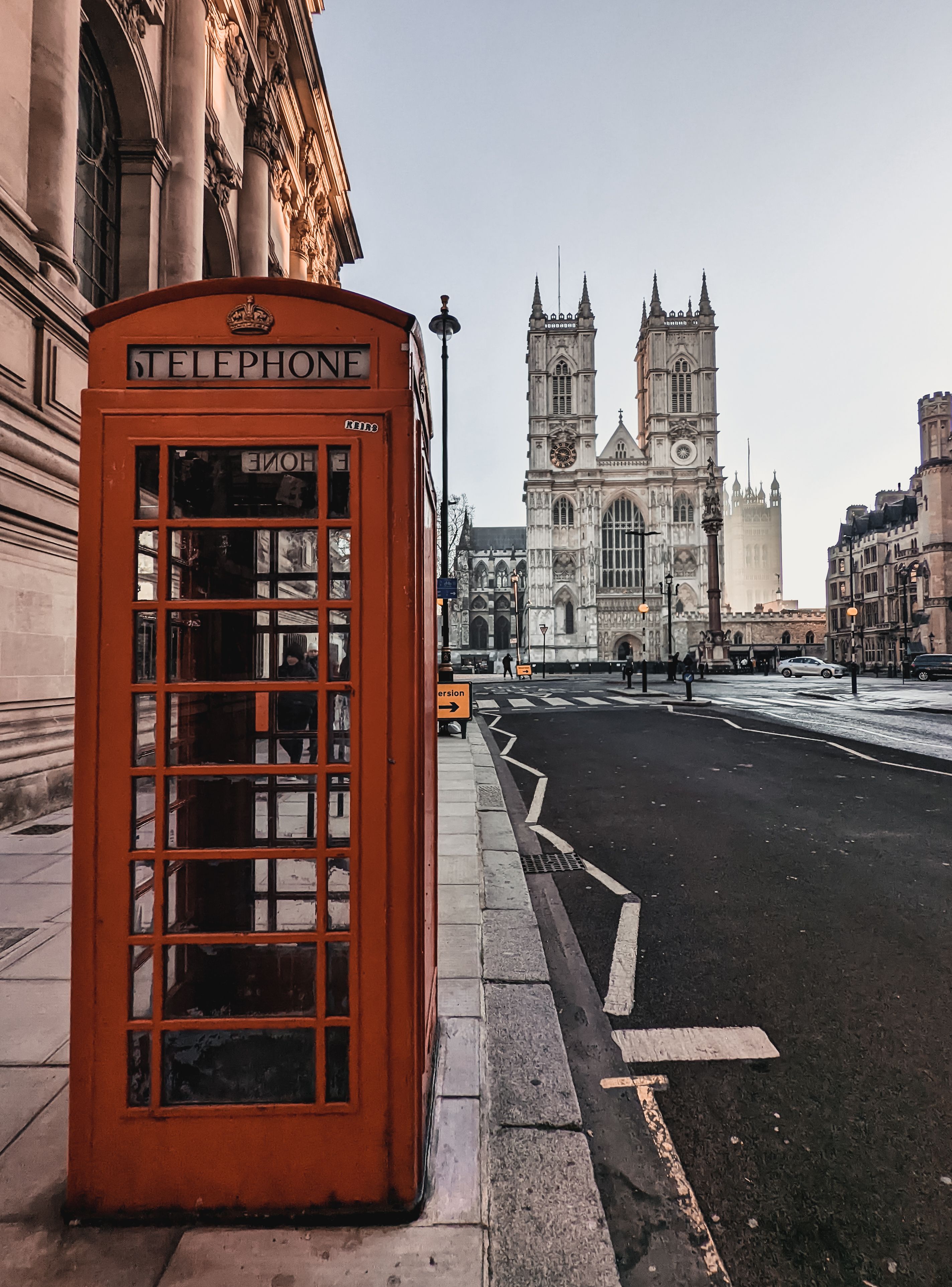 2847x3846 View of a Red Telephone Booth and the Westminster Abbey in London, England, UK · Free