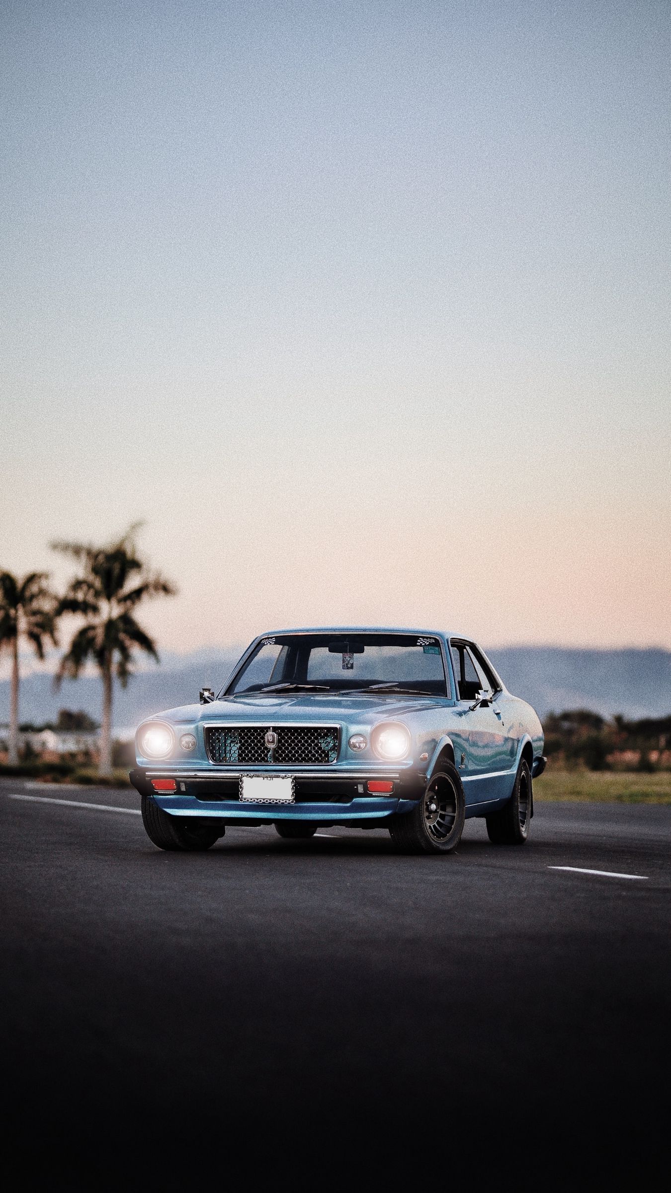 1350x2400 Download wallpaper 1350x2400 car, old, blue, front view, headlights, light iphone 8+/7+/6s+/for parallax HD background