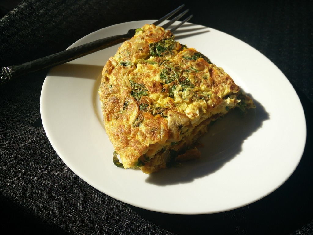 1024x768 Public domain stock image. Omelette eggs fork