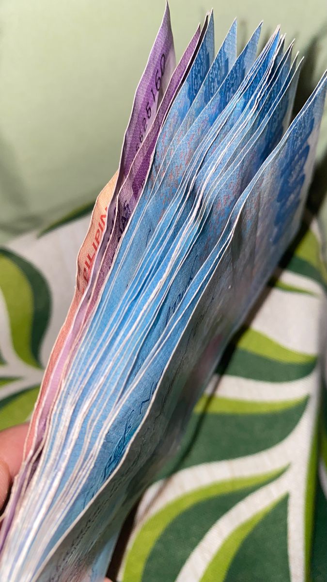 675x1200 Peso banknotes fanned out. Rainbow money philippines, Ringgit malaysia money wallpaper, Cash